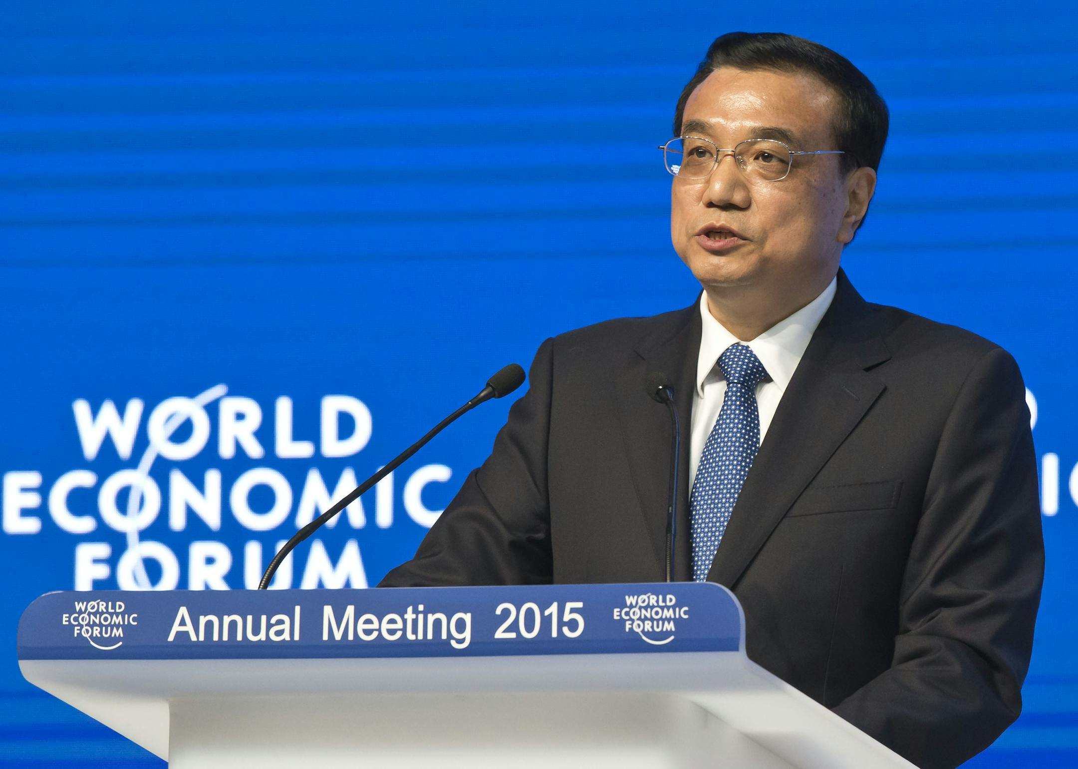 Chinese Premier Li Keqiang speaks during the panel "The Global Impact of China's Economic Transformation" in Davos, Switzerland, Wednesday, Jan. 21, 2015. The meeting runs Jan. 21 through 24 under the overarching theme "The New Global Context". (AP Photo/Michel Euler) ORG XMIT: MEU141