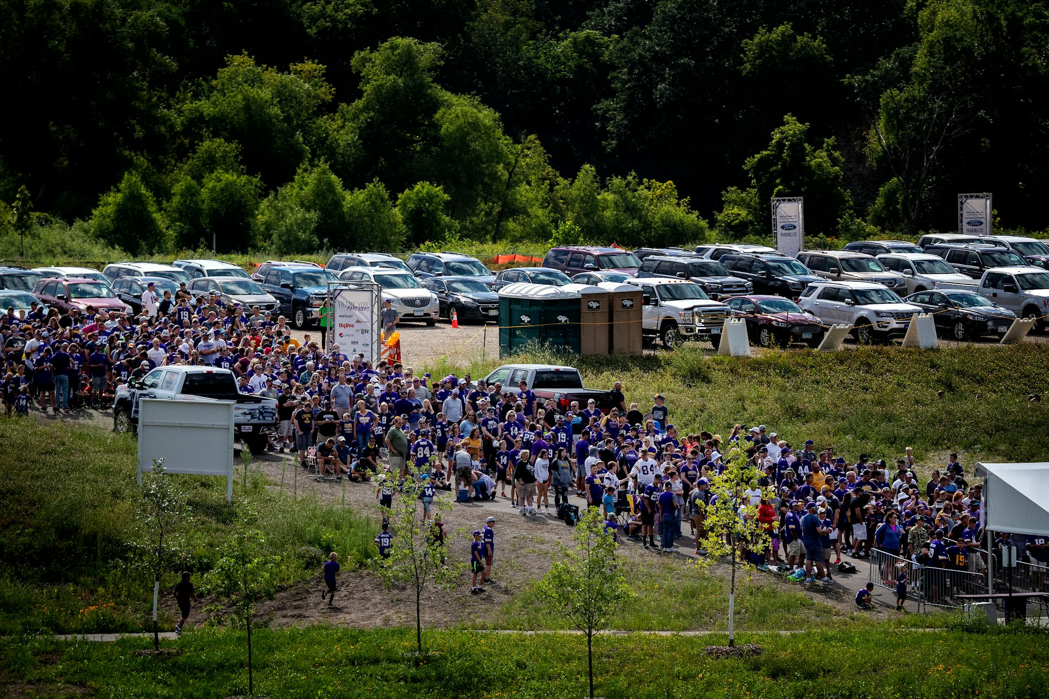Fans lined up at the gate to enter Vikings training camp at TCO Performance Center in Eagan on Monday. ] CARLOS GONZALEZ • cgonzalez@startribune.com – Eagan, MN – July 29, 2019, TCO Performance Center, NFL, Minnesota Vikings Training Camp,
