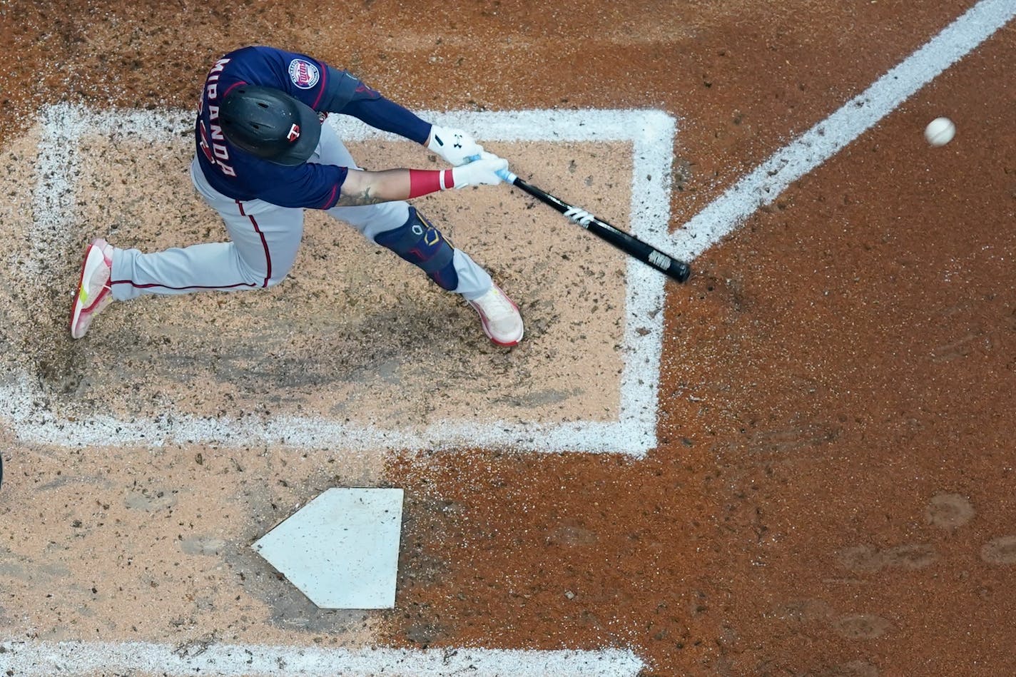 Minnesota Twins' Jose Miranda hits a two-run scoring double during the third inning of a baseball game against the Milwaukee Brewers Tuesday, July 26, 2022, in Milwaukee. (AP Photo/Morry Gash)