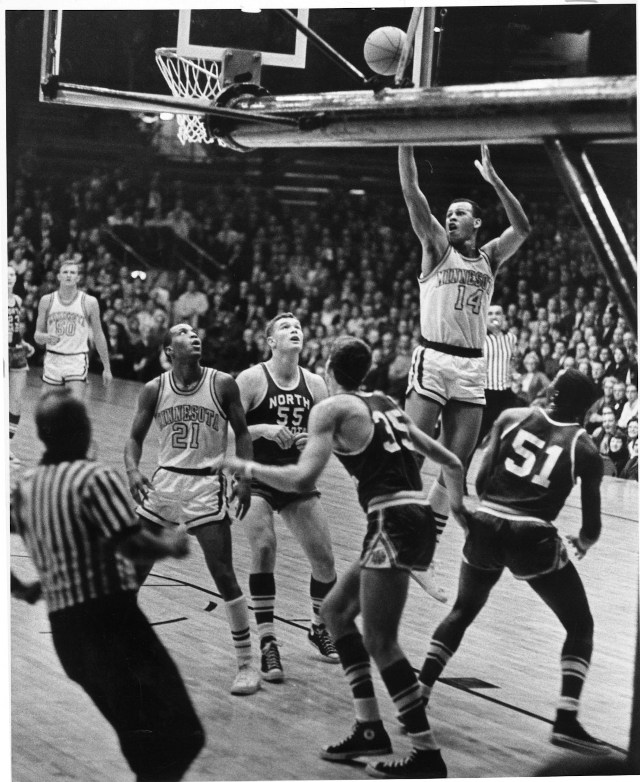 Game action of former Gopher, Lou Hudson from 1965. Minneapolis Sunday Tribune photo taken by staff photographer John Croft , Dec. 3,1965