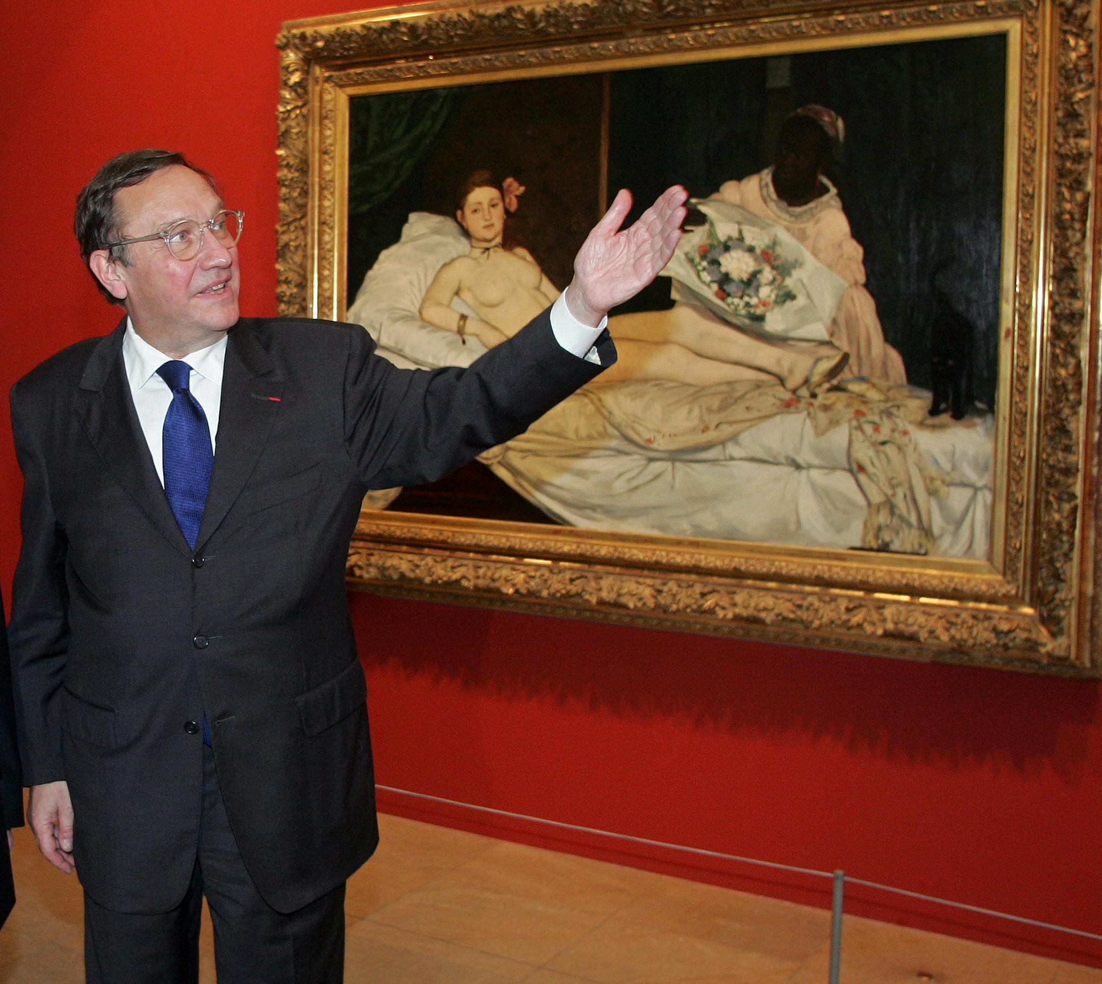 Chinese Premier Wen Jiabao, left, listens to Orsay museum director Serge Lemoine in front of French artist Edouard Manet's "Olympia" (1863), Monday, Dec. 5, 2005 in Paris. Wen is on the second day of a four-day visit to France. (AP Photo/Francois Guillot, pool) ORG XMIT: MPR101