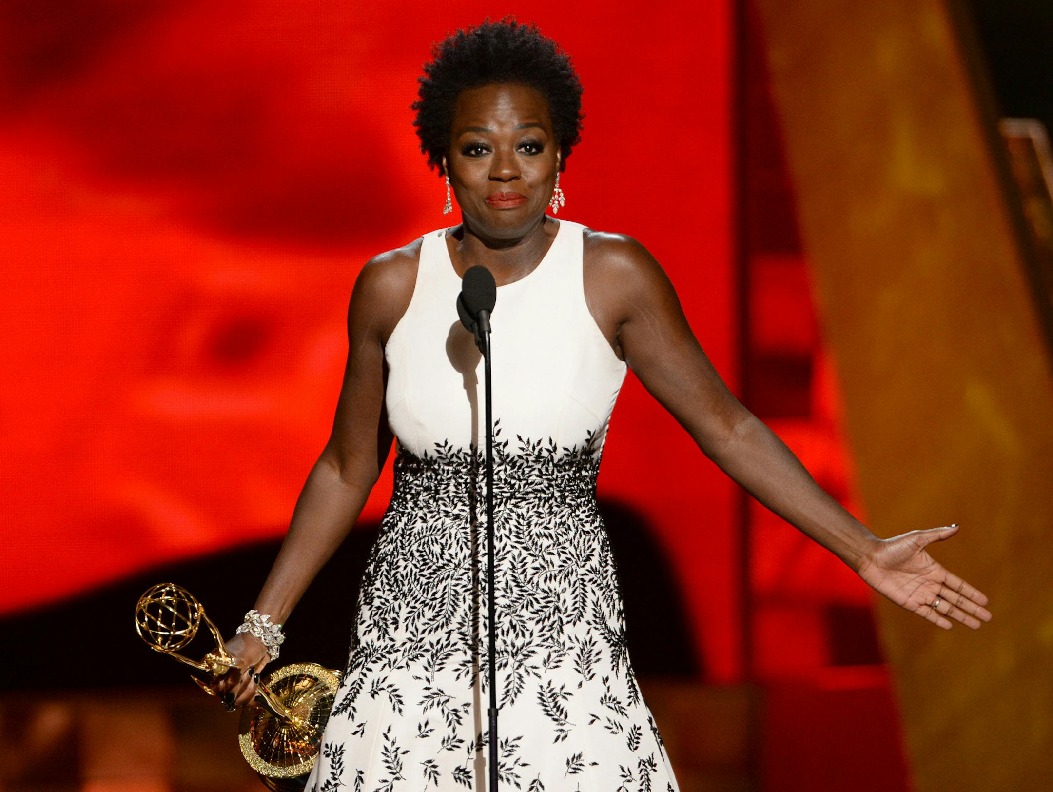 IMAGE DISTRIBUTED FOR THE TELEVISION ACADEMY - Viola Davis accepts the award for outstanding lead actress in a drama series for &#xec;How to Get Away With Murder&#xee; at the 67th Primetime Emmy Awards on Sunday, Sept. 20, 2015, at the Microsoft Theater in Los Angeles. (Photo by Phil McCarten/Invision for the Television Academy/AP Images) ORG XMIT: INVL