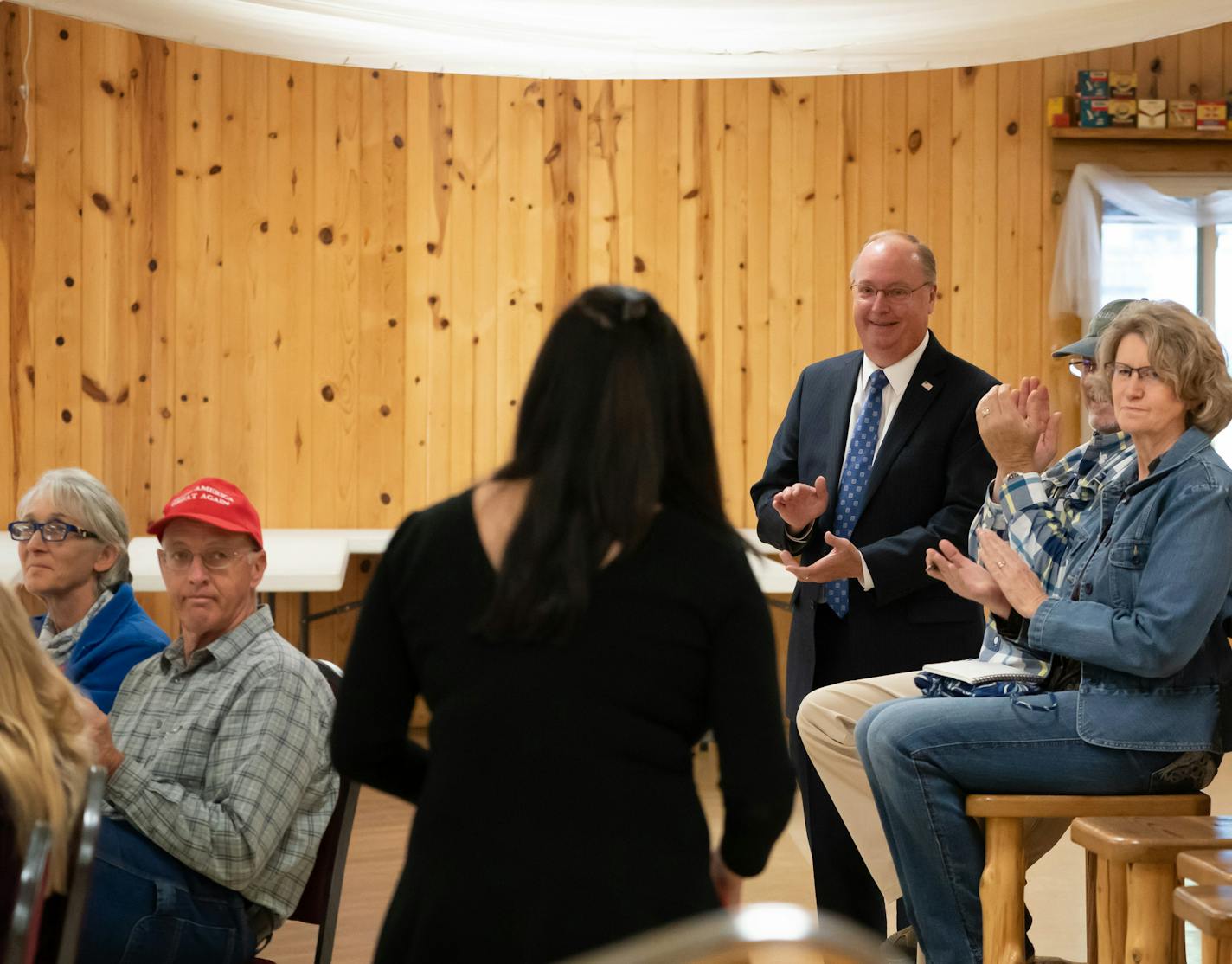 Rep. Jim Hagedorn applauded for his wife, and Minnesota Republican state chair, Jennifer Carnahan after she spoke to a gathering of Le Sueur County voters at the Caribou Gun Club. ] GLEN STUBBE • glen.stubbe@startribune.com Thursday, September 10, 2020