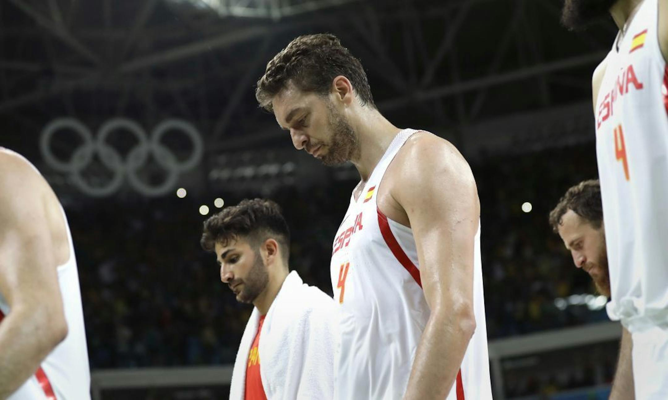 Spain's Ricky Rubio, left, and Pau Gasol (4) walk off the court following their loss to Brazil in a men's basketball game at the 2016 Summer Olympics in Rio de Janeiro, Brazil, Tuesday, Aug. 9, 2016.