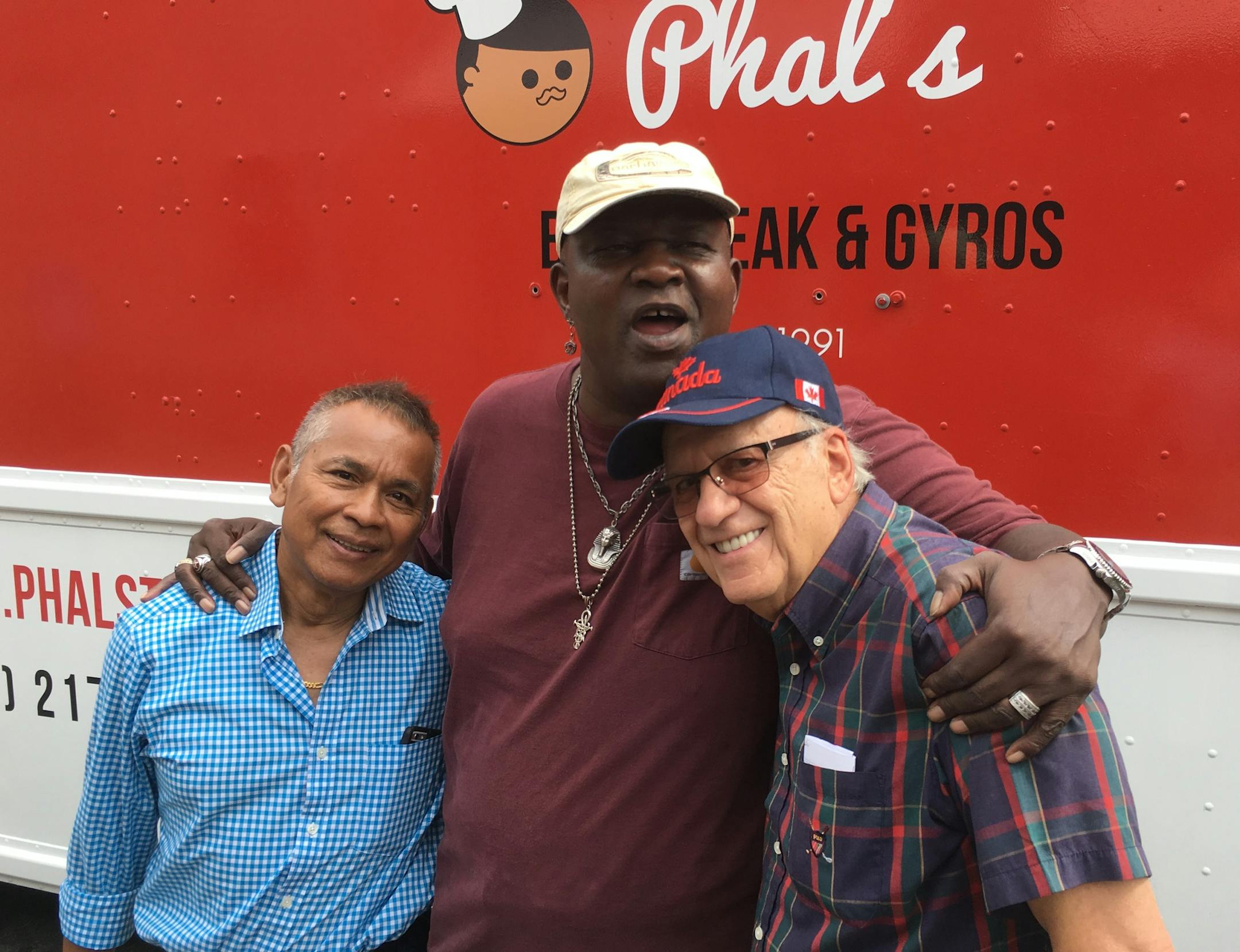 Sophal Nhep, 26-year owner of Best Steak & Gyros, at left, joined Project for Pride's Sam Riley and former exec Joe Selvaggio.