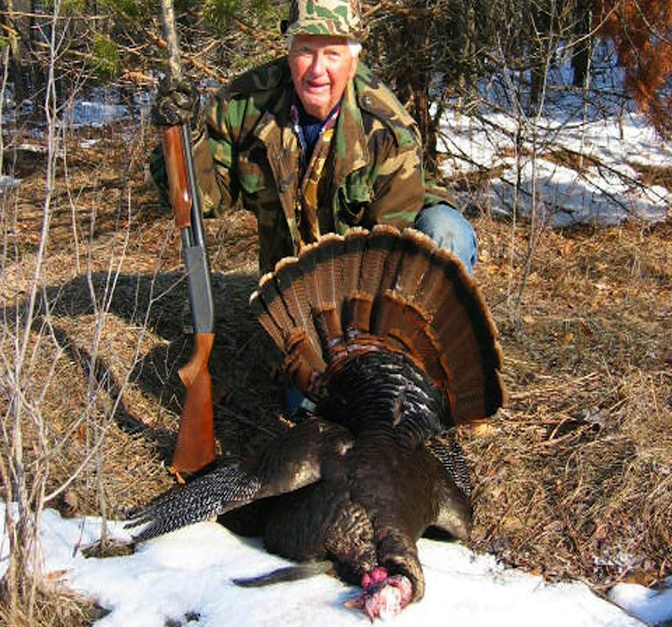 Dave Conger, 86, of Lake George, Minn., with his first-ever gobbler, which he bagged last week while hunting with his son-in-law, Tom Anderson, of North Branch. Conger turns 87 this month.