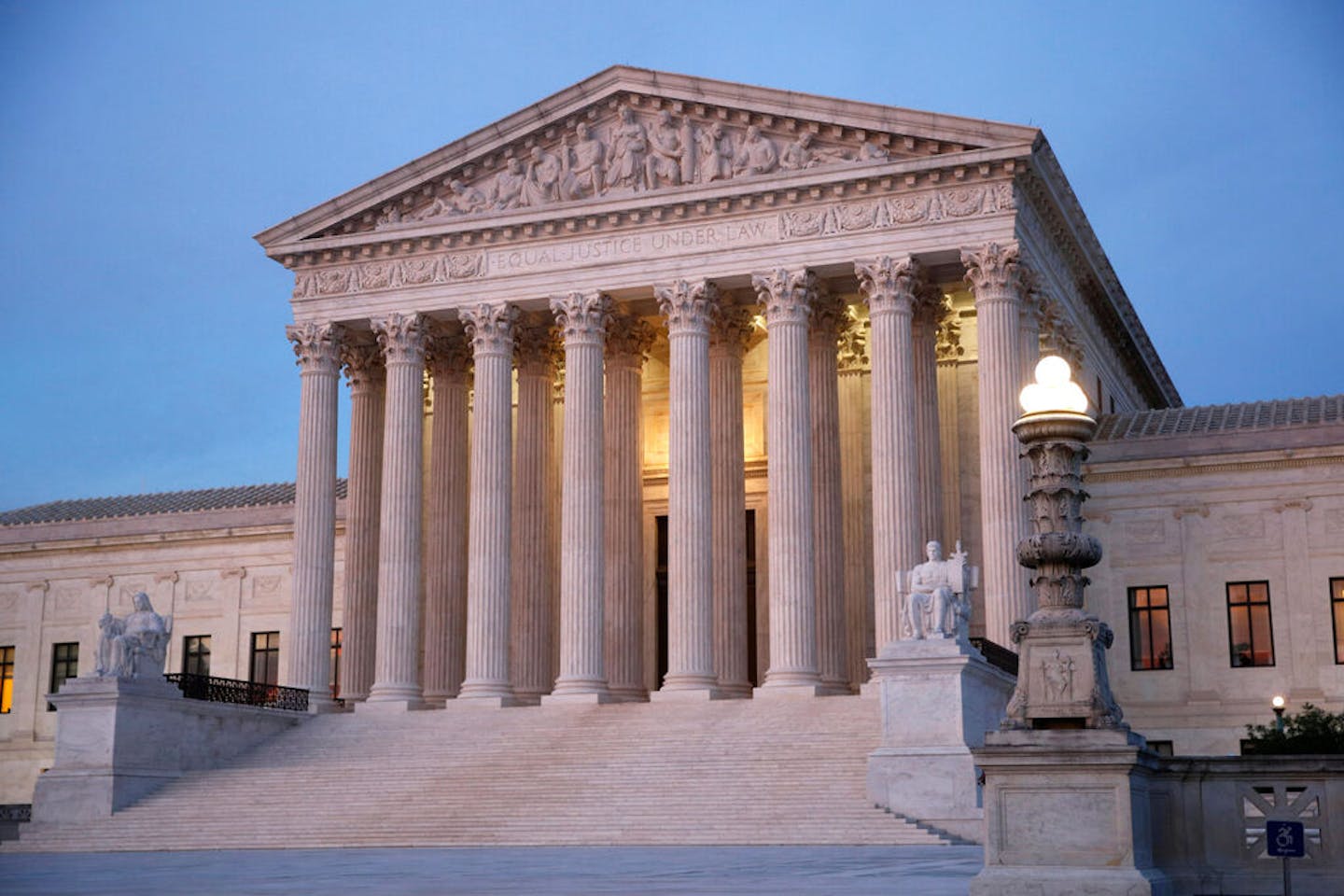 In this May 23, 2019, photo, the U.S. Supreme Court building at dusk on Capitol Hill in Washington. The Supreme Court is rejecting a challenge to fede