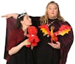 Taj Ruler and Lauren Anderson wrestle with dragons in "Shame of Thrones: Stupidity War" at Brave New Workshop.