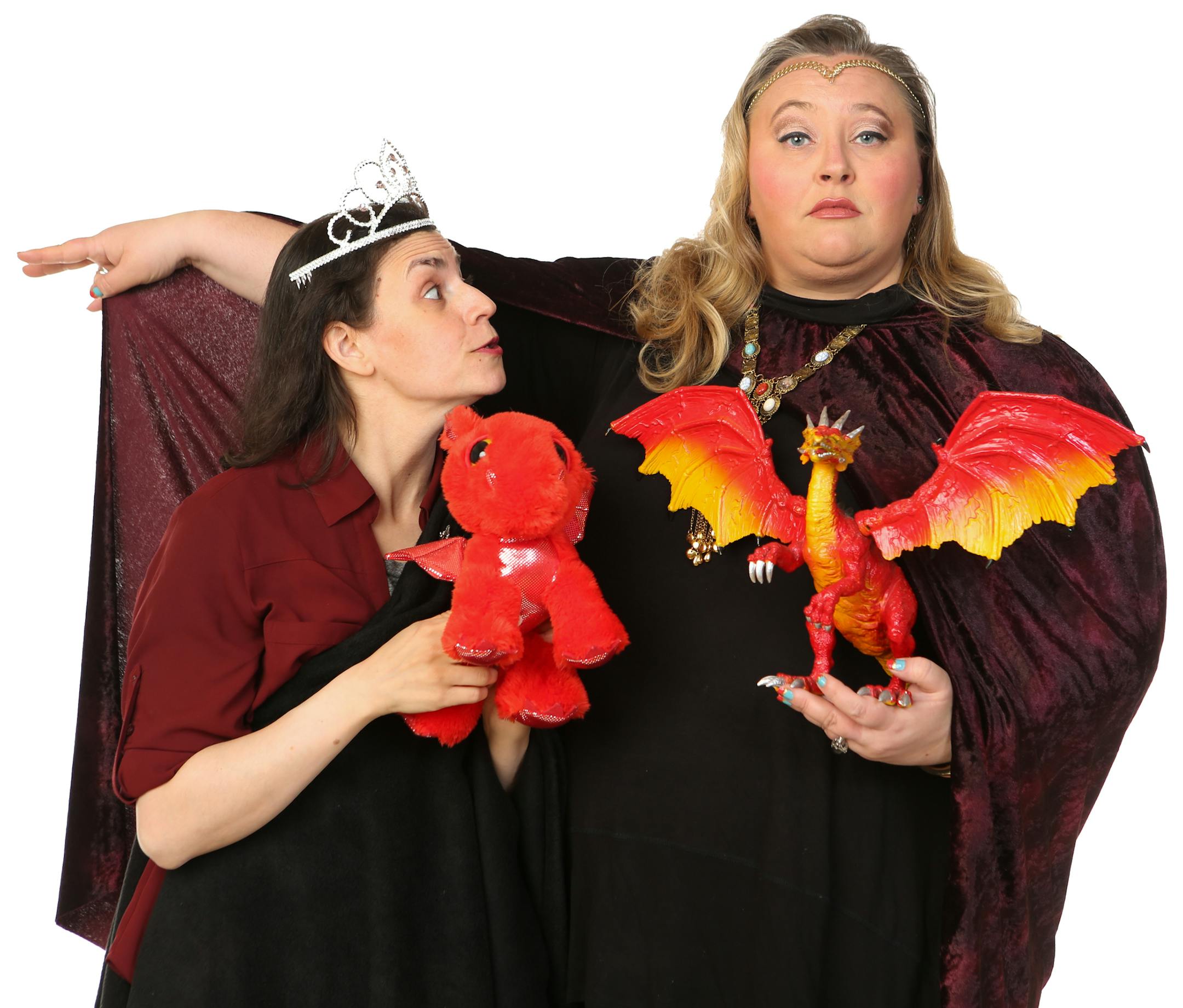 Taj Ruler and Lauren Anderson wrestle with dragons in "Shame of Thrones: Stupidity War" at Brave New Workshop.