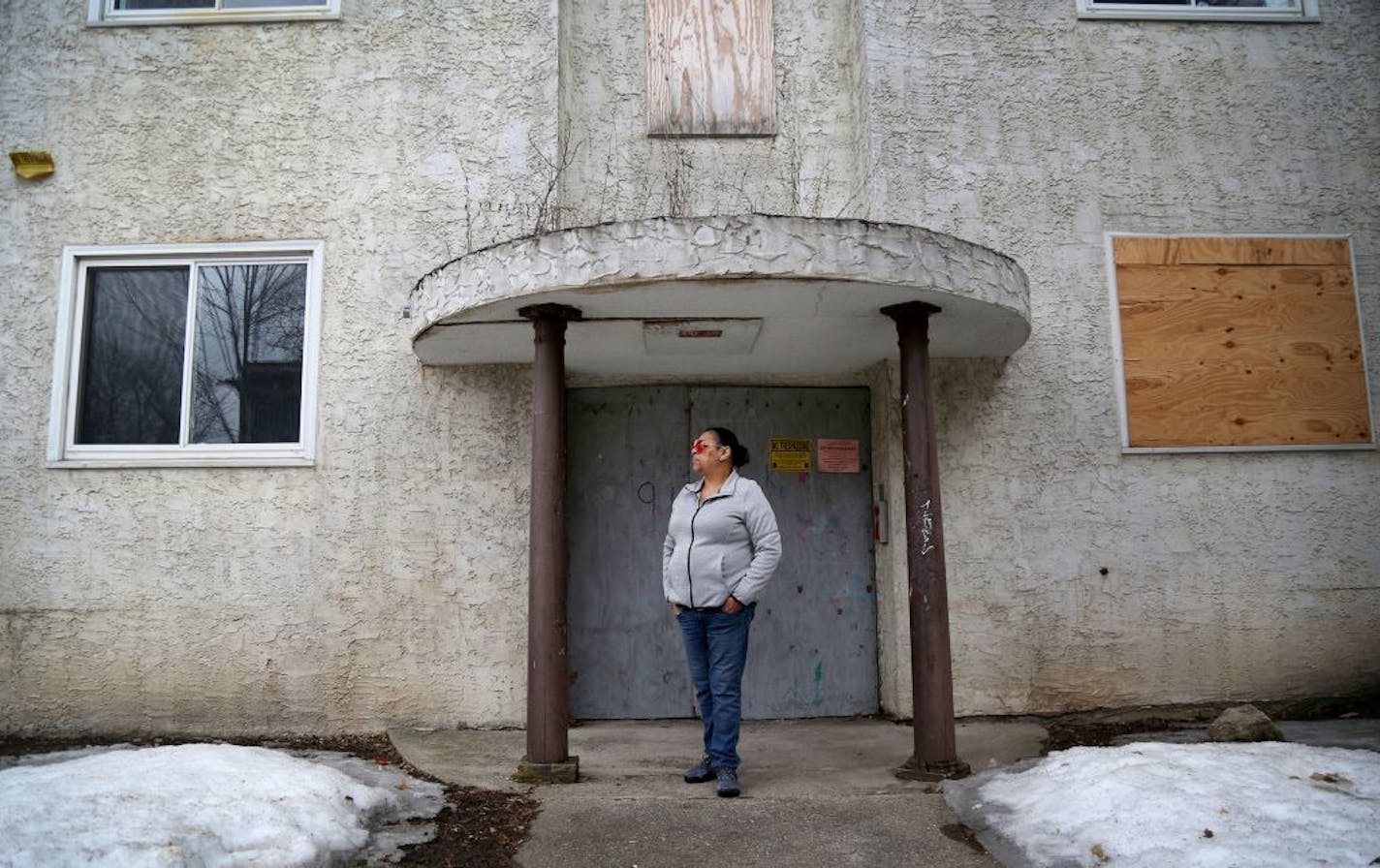 Maleta "Queen" Kimmons stood near a boarded-up property and a vacant lot on the 900 block of Oliver Ave. N. on Friday, March 30, in her neighborhood in north Minneapolis.