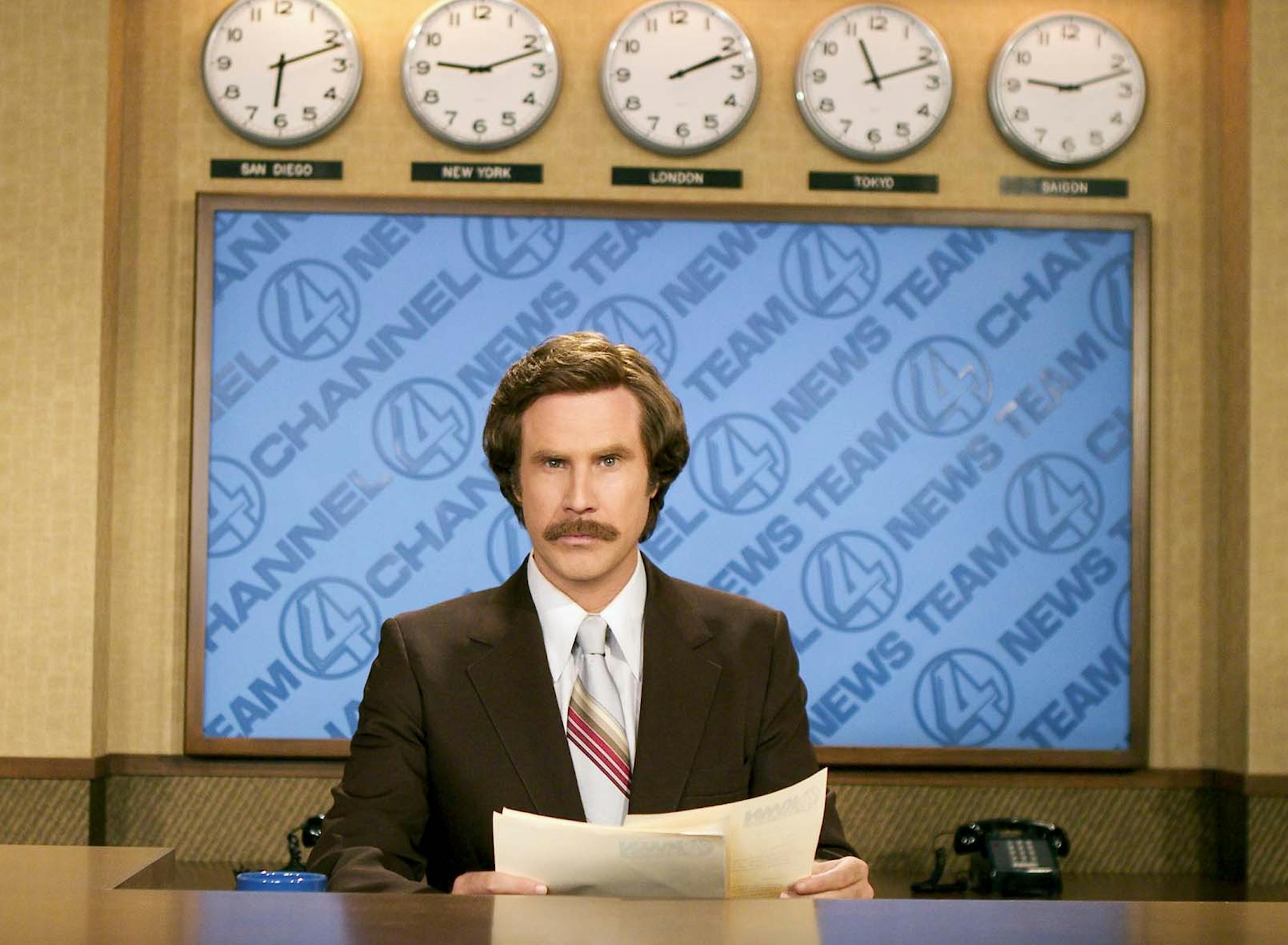 FILE - This 2004 file photo originally released by Paramount Pictures shows Will Ferrell as anchorman Ron Burgundy in "Anchorman: The Legend of Ron Burgundy." Emerson College is changing the name of its school of communication. The college in Boston will rename the school for one day only, the Ron Burgundy School of Communication on Dec. 4 to honor the fictitious television anchorman. Ferrell, in character, is scheduled to share his path to journalism greatness with students. His visit will incl