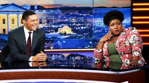 Host Trevor Noah with Dulce Sloan on “The Daily Show.” Sloan has been a correspondent on the show since 2017.