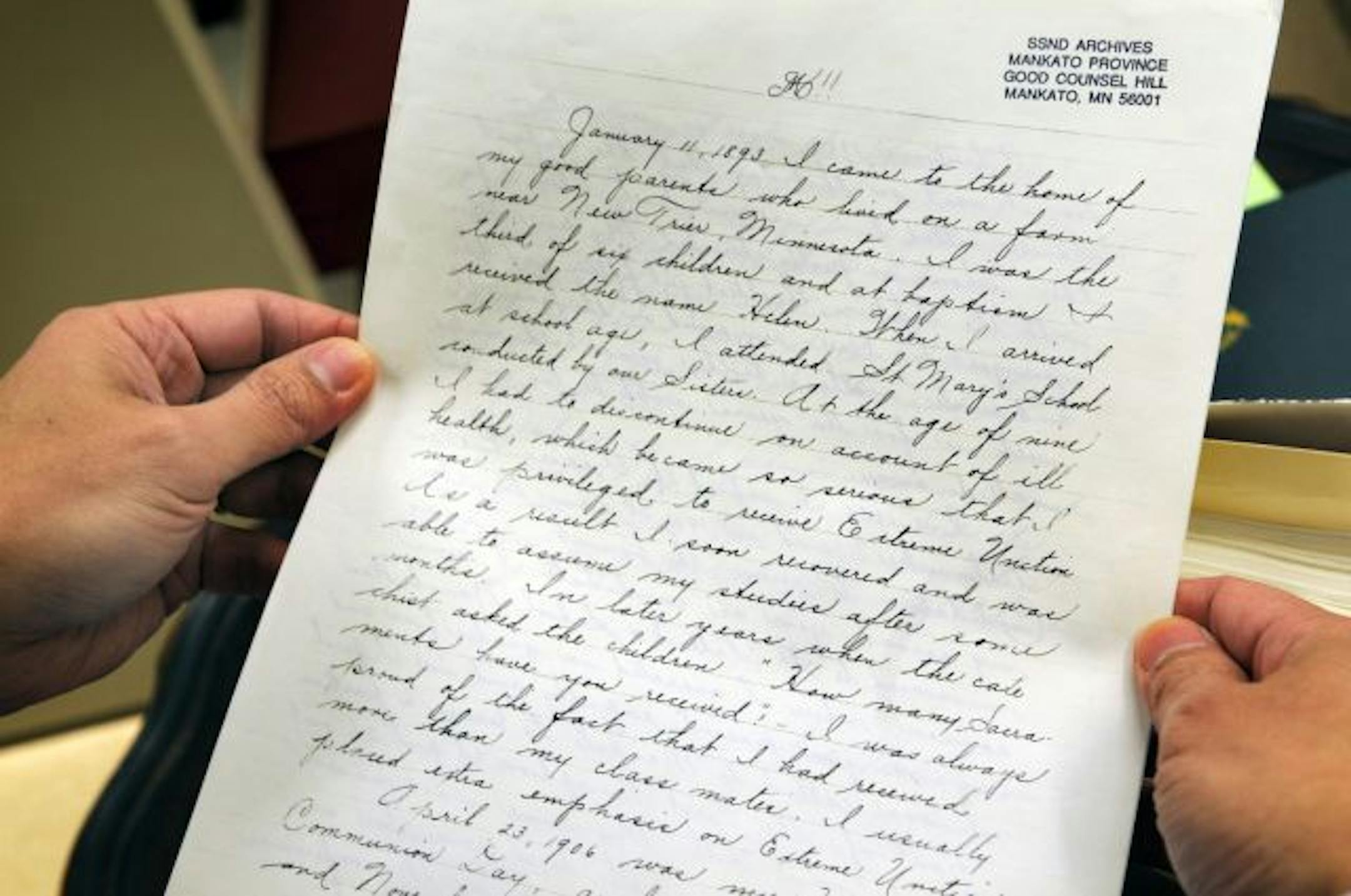 Dr Kelvin Lim held a nun's essay, used to measure the idea density in a sentence. The nuns were ideal to study because of how much they had in common.