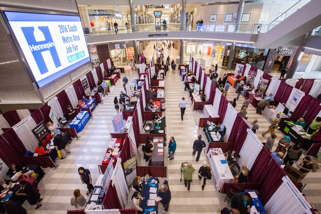 People walked to different vendors and booths at the South Metro Job Fair at Mall of America in 2016.