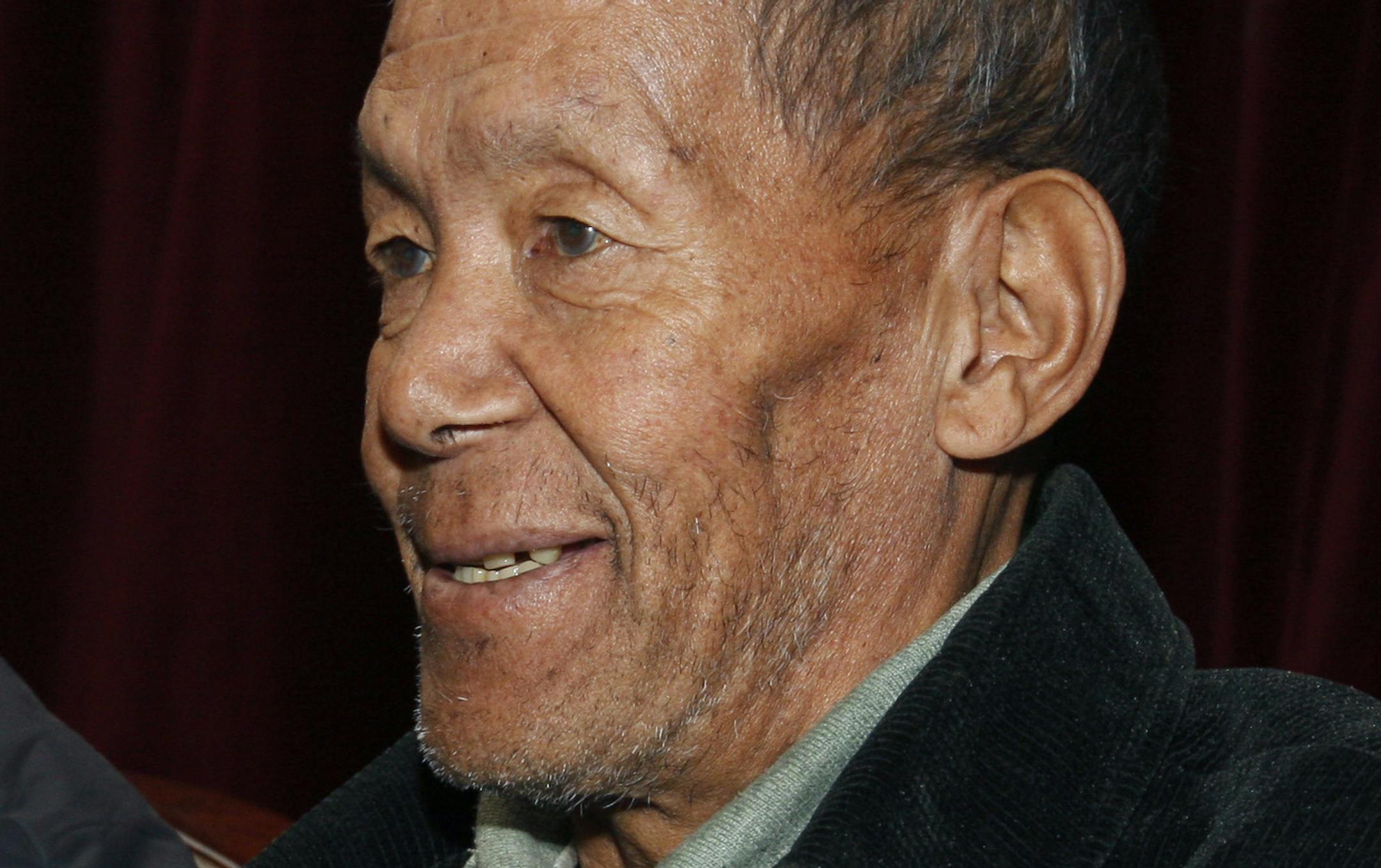 FILE- A Nov. 29, 2009 file photo of Ang Rita Sherpa during a press conference in Katmandu, Nepal. The veteran Nepalese Sherpa guide who was the first person to climb Mount Everest 10 times has died at the age of 72 after a long illness, family members said. (AP Photo/Binod Joshi, File)