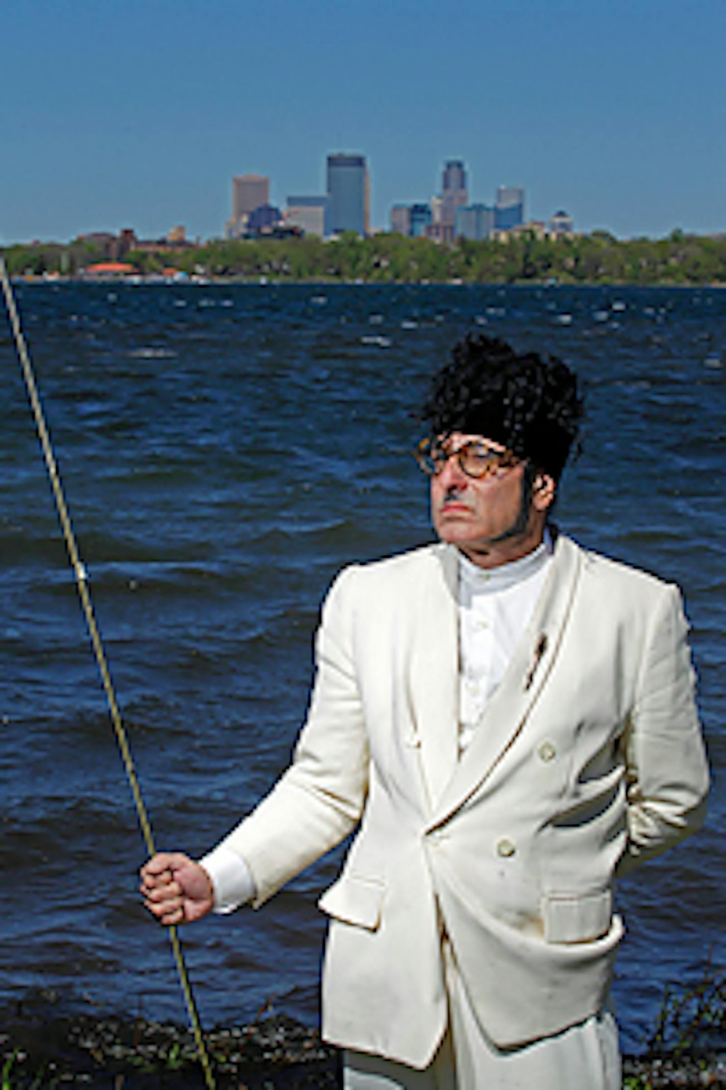 Minneapolis fixture Scott Seekins sticks to his white-suit-in-the-summer routine at all times, even while fishing