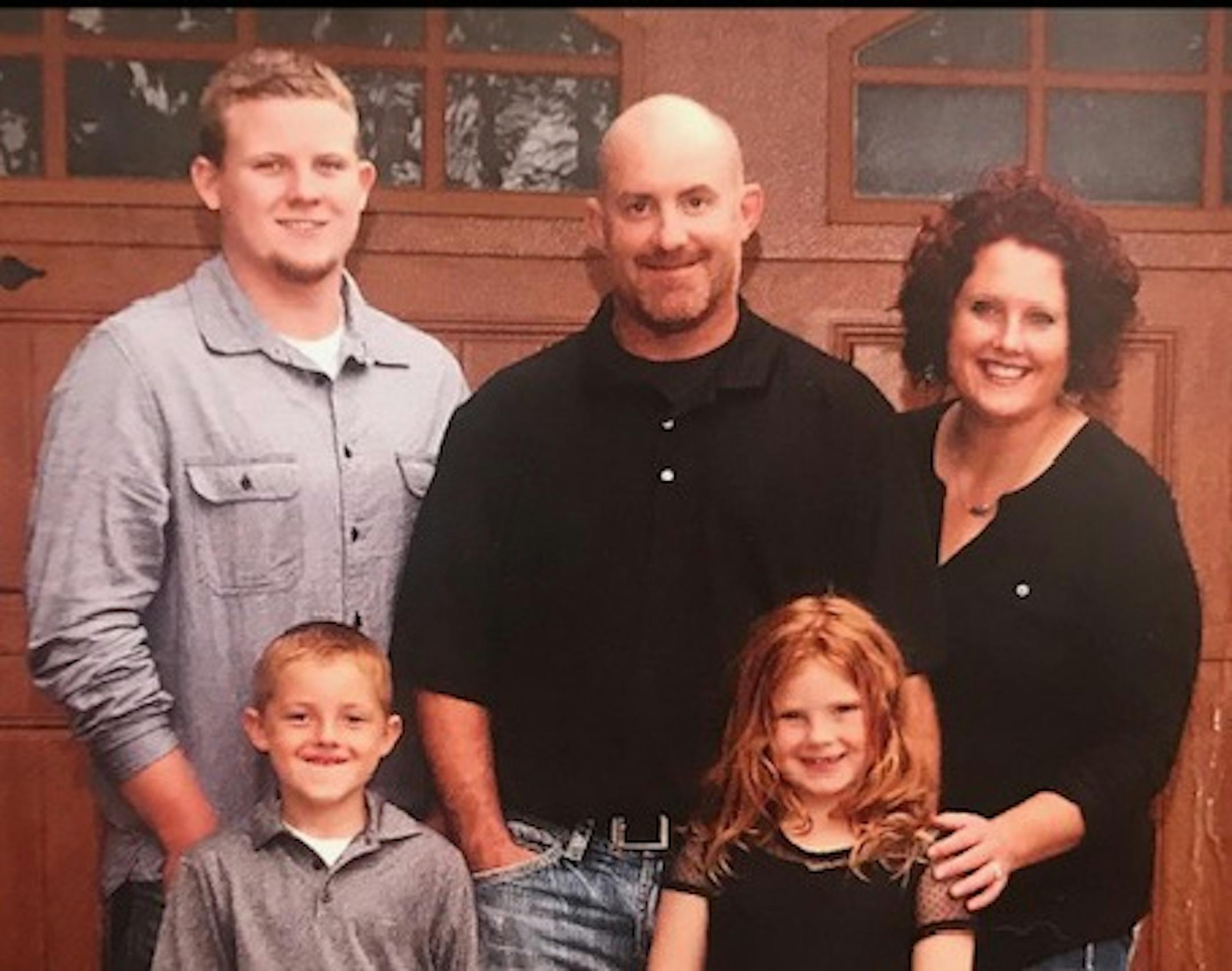 Halverson family photo. Front: Tyson, Brooklin. Back: Jacob MacDonald, Marcus Halverson, mother Bonni Halverson.