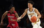 Gophers guard Amir Coffey challenged Arkansas in a game last December at Williams Arena. Coffey, a junior, decided to leave the Gophers early to turn 