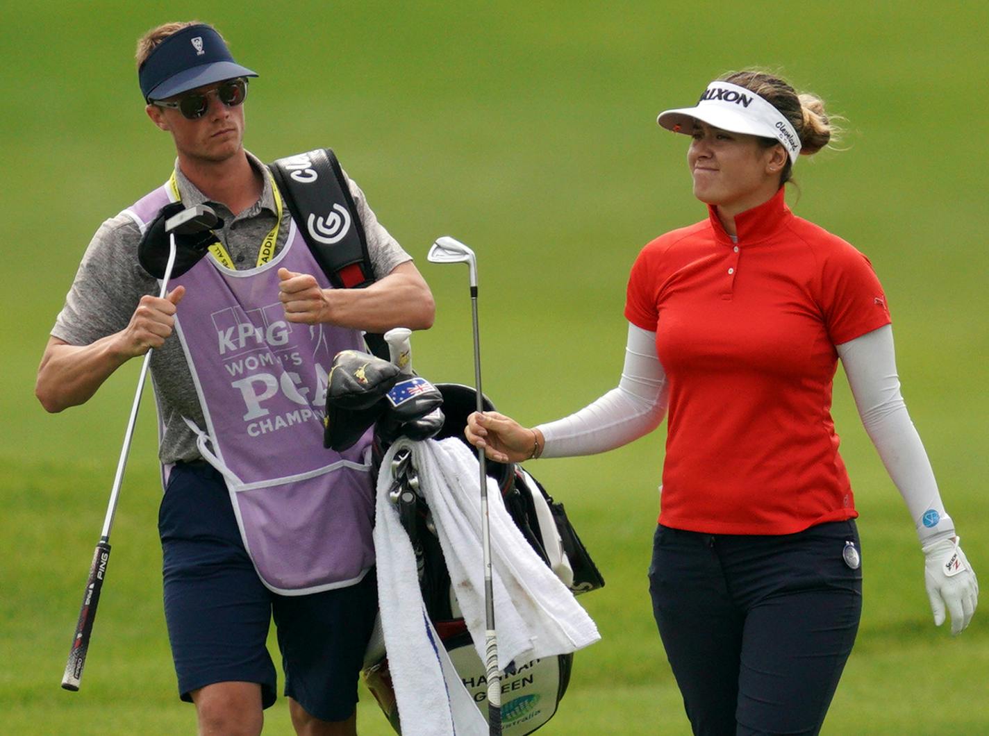 Hannah Green handed off a club to her caddie as she walked down the 9th hole fairway. ] ANTHONY SOUFFLE &#x2022; anthony.souffle@startribune.com Golfers took part in the second day of competition play during the KPMG Women's PGA Championship Tournament Friday, June 21, 2019 at Hazeltine National Golf Club in Chaska, Minn.