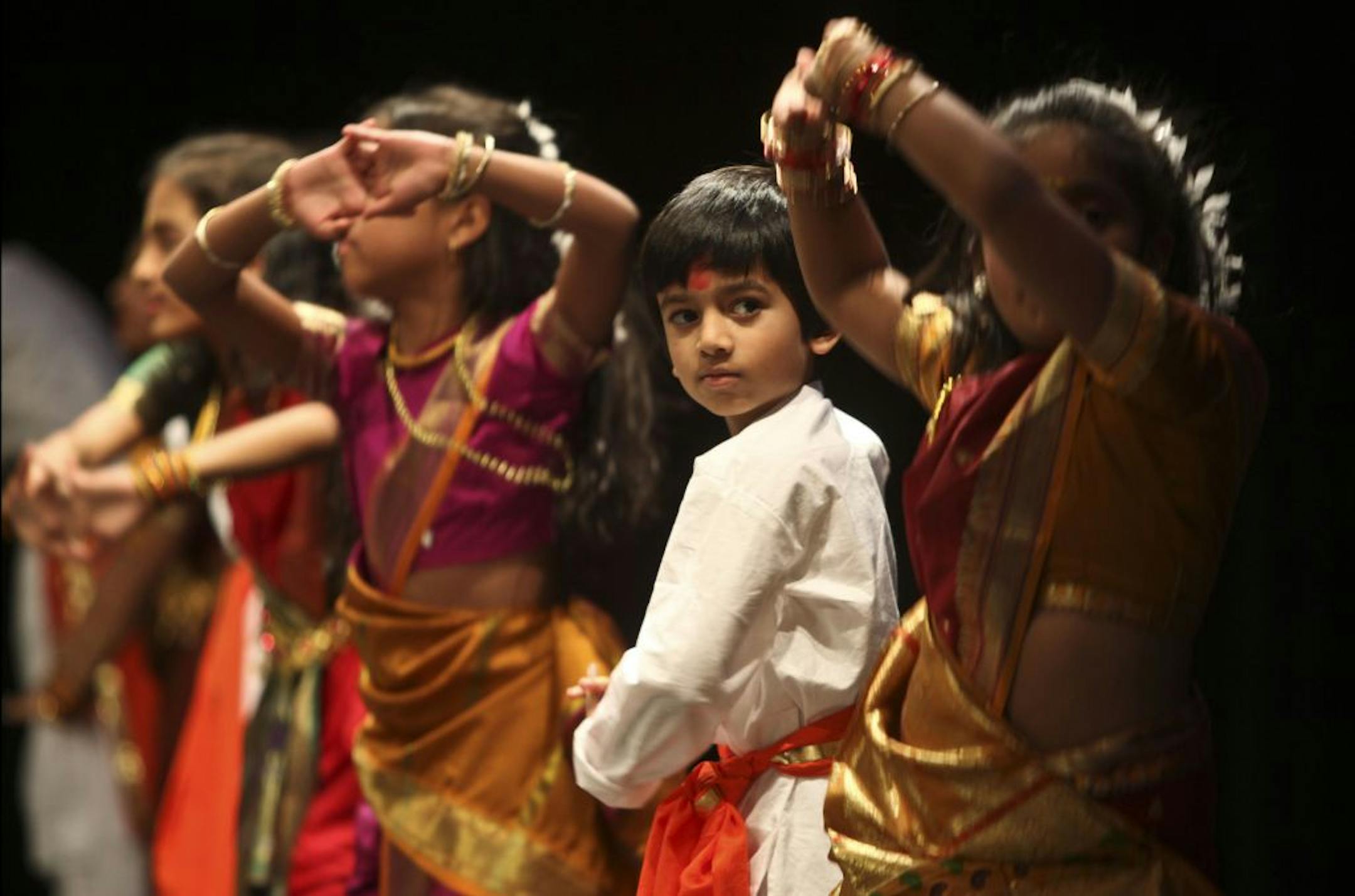 Aditya Kshirsagar, 6, performed with the rest of his group, at the Diwali festival held at Hopkins High School in Minnetonka Saturday, November 5, 2011.