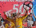 Joey Logano celebrated in Victory Lane after winning the NASCAR Sprint Cup series auto race at Charlotte Motor Speedway in Concord, N.C., on Sunday.