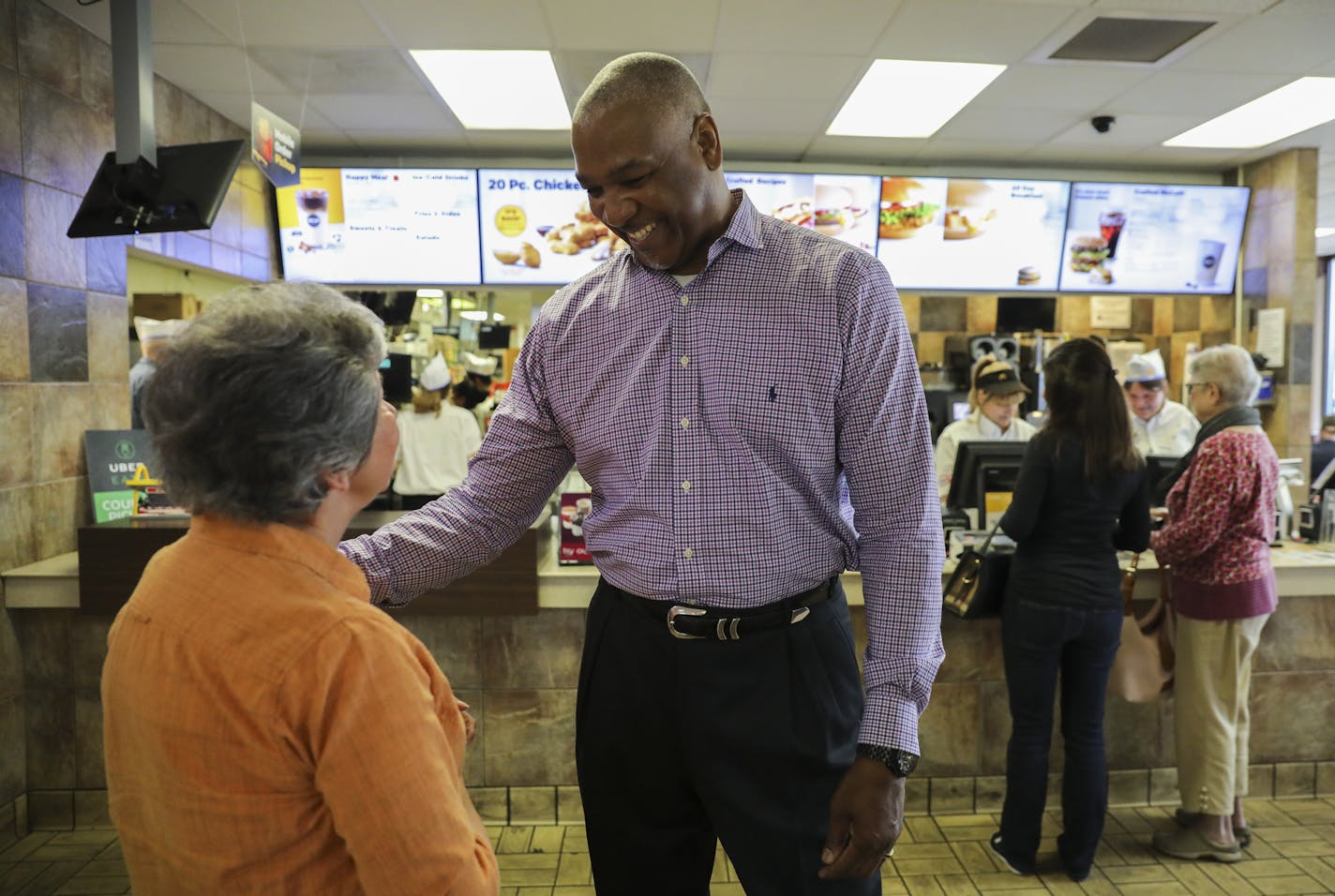 Connie Dufresne, 70, chatted with current owner Tim Baylor telling him she was at the grand opening of this McDonald's when she was ten year old as she arrived at the 60th anniversary celebration of the Roseville McDonald's. This event included sixty cents hamburgers, free cake and throw back uniforms on Monday, September 25, 2017, in Roseville, Minn. This Roseville location was the first McDonald's in Minnesota and 63rd nationwide. Now there are over 14,000 in the U.S. ] RENEE JONES SCHNEIDER &