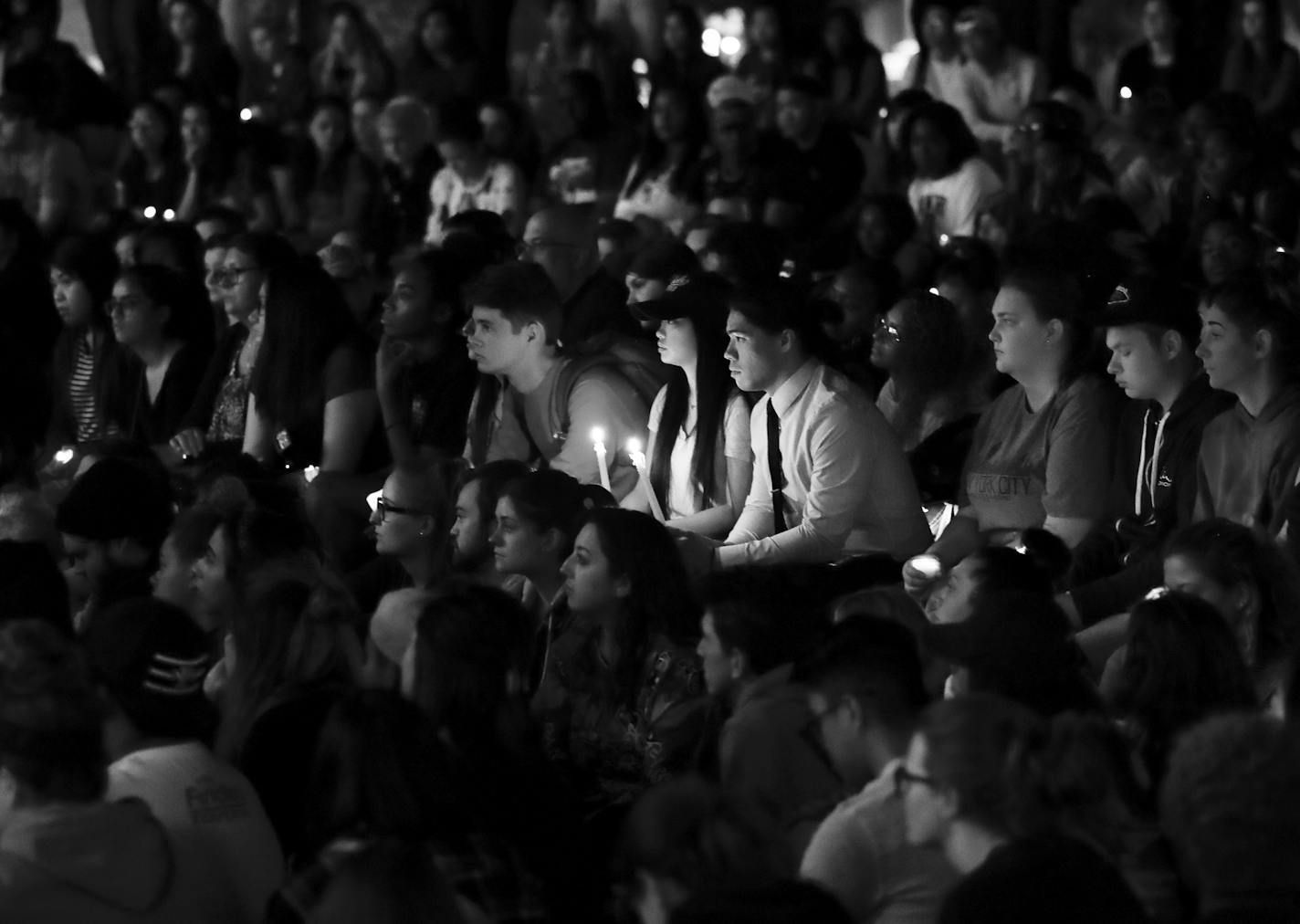 Students from University of Nevada Las Vegas hold a vigil Monday, Oct. 2, 2017, in Las Vegas. A gunman on the 32nd floor of the Mandalay Bay casino hotel rained automatic weapons fire down on the crowd of over 22,000 at an outdoor country music festival Sunday. (AP Photo/Gregory Bull) ORG XMIT: MIN2017100222090020