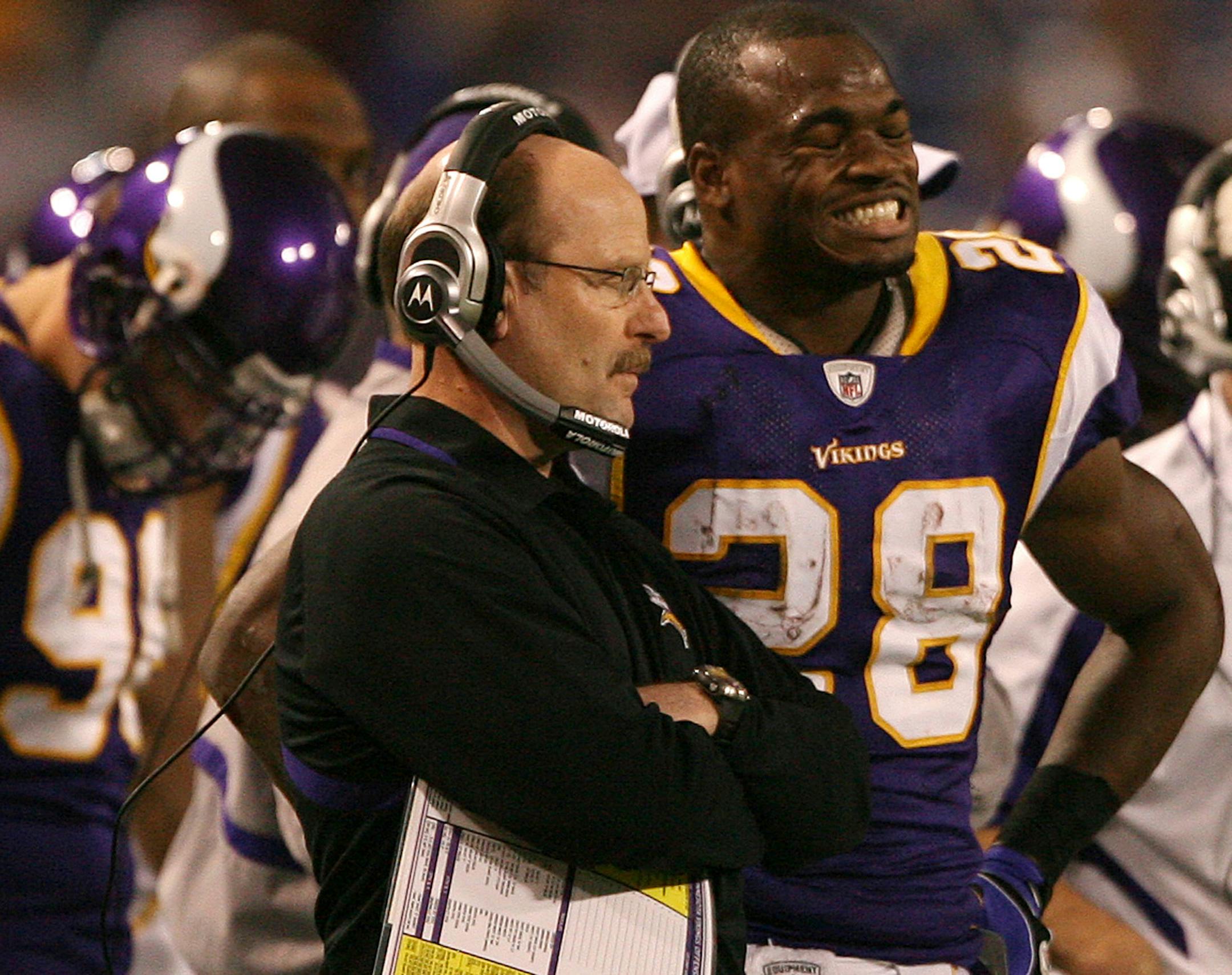 Vikings running back Adrian Peterson was not happy as he talked with coach Childress after he fumbled in the second half.