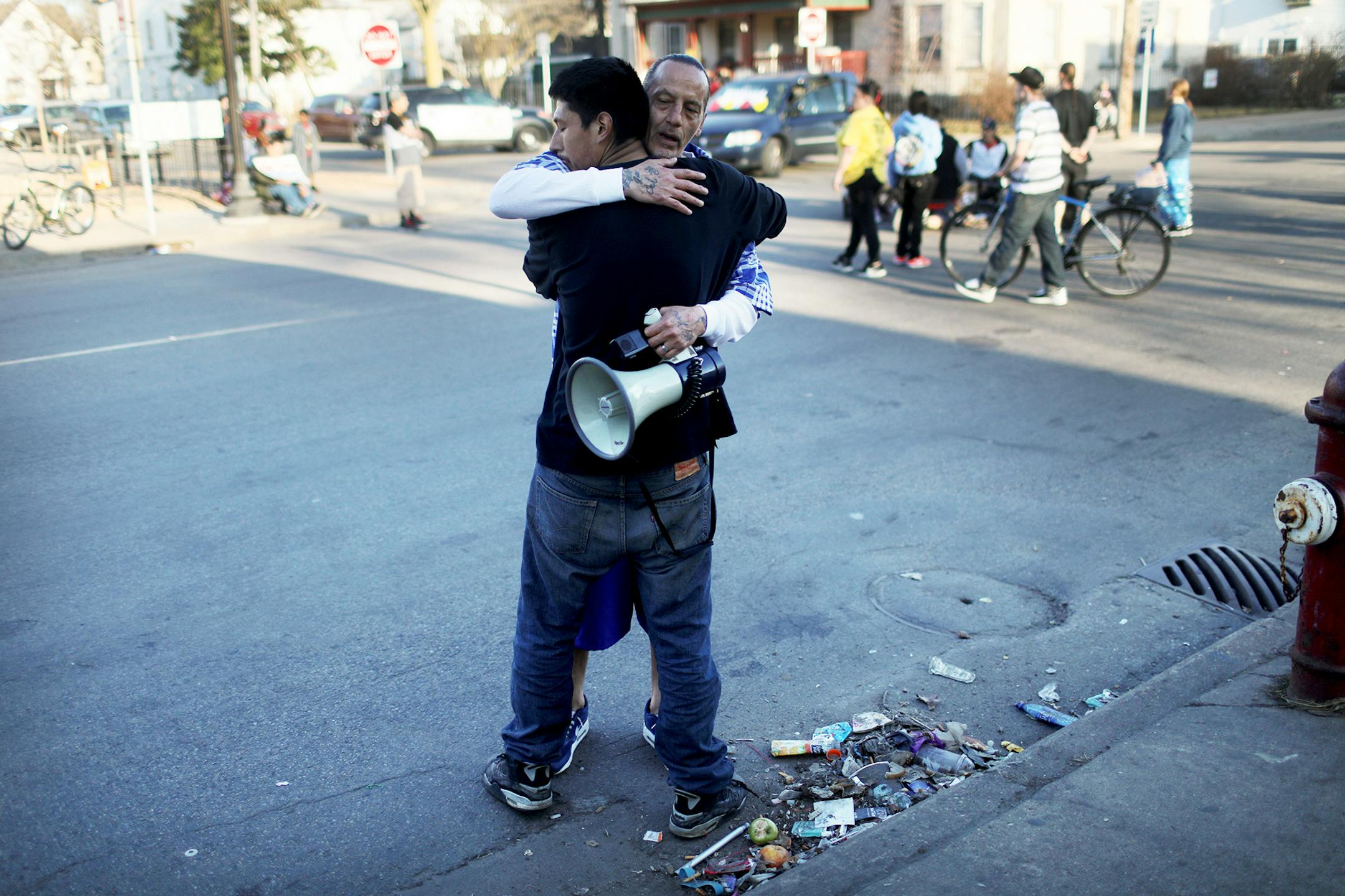 James Cross, the founder of the street outreach group Natives Against Heroin, spent nearly half of his life in prison for drug-related crimes but is working hard now to help people in his Native American community, particularly the poor and those with substance abuse problems. Here, Cross hugged a man after members of NAH and the Native American community shut down an intersection at Bloomington Ave. near E. 25th St. where drug dealing had been identified and seen Thursday, April 26, 2018, in so