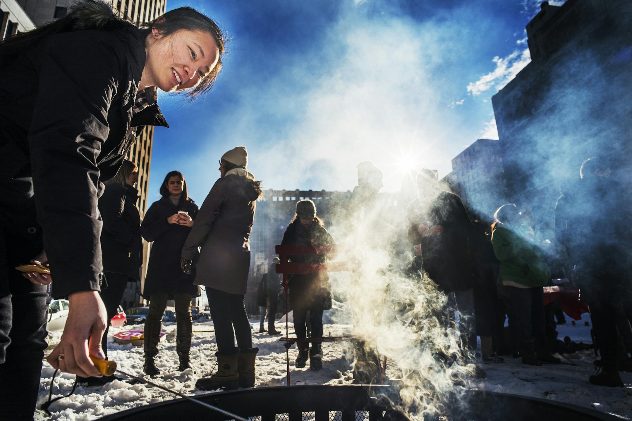 Tiffany Kong who works nearby browned a smore, says "a garden would be beautiful. More greenery downtown would be nice."]Over the next several months, the area near the Green Line's Central Station in St. Paul will host a series of pop-up events designed to make this vacant space at the center of downtown more inviting and vibrant for transit riders, employees, residents and visitors. Richard Tsong-Taatarii/rtsong-taatarii@startribune.com
