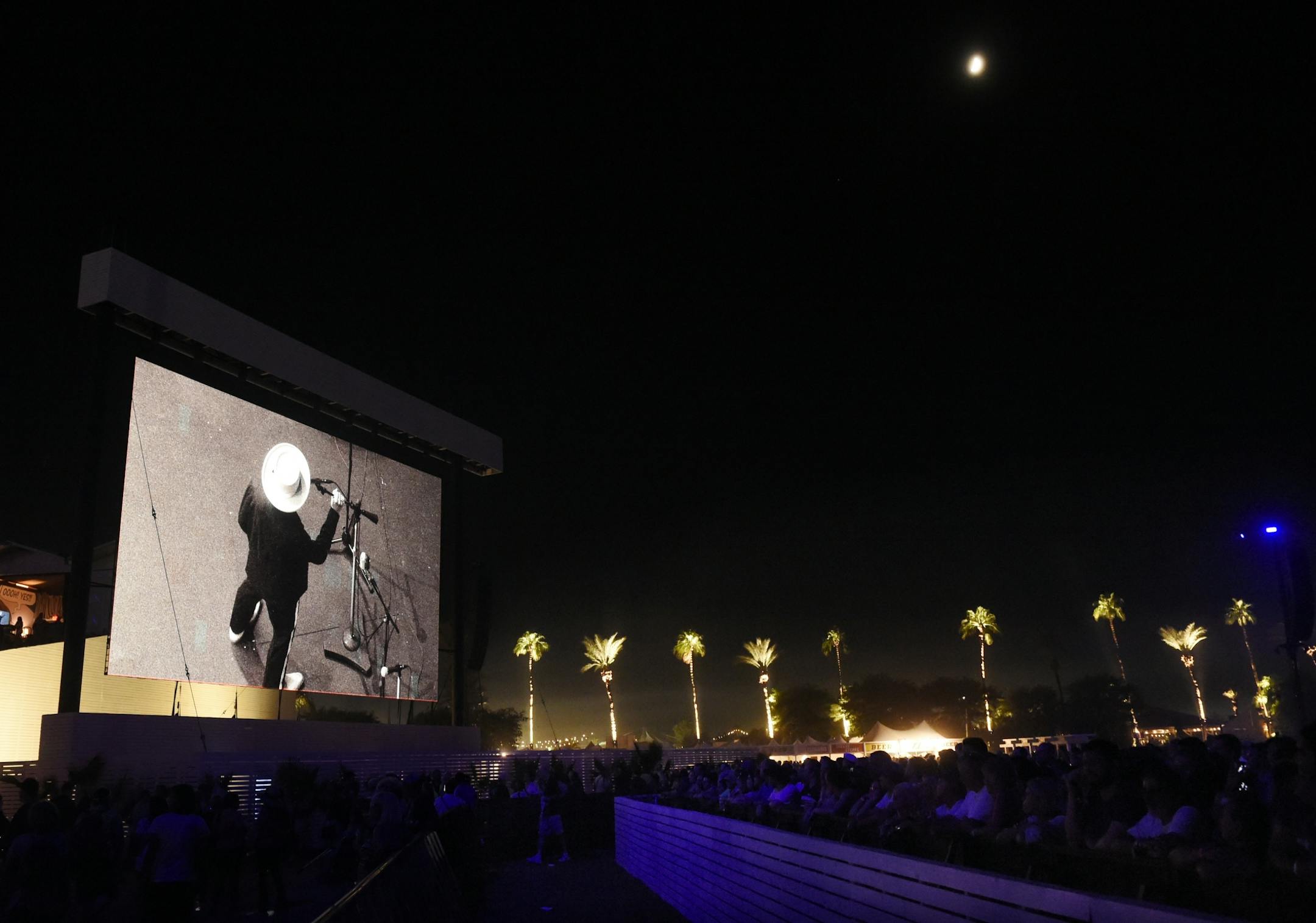 Bob Dylan is seen on a video monitor during his performance on day 1 of the 2016 Desert Trip music festival at Empire Polo Field on Friday, Oct. 7, 2016, in Indio, Calif.