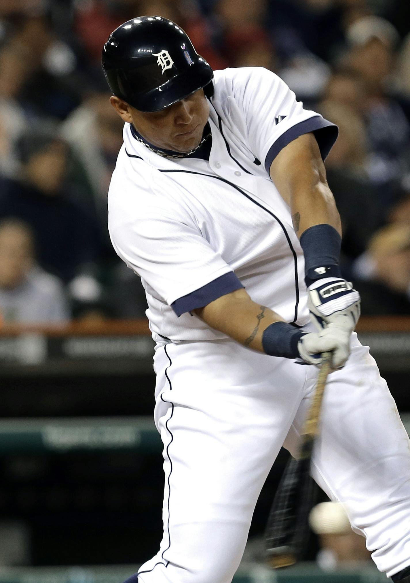 Detroit Tigers' Miguel Cabrera hits a double against the Kansas City Royals in the fourth inning of a baseball game in Detroit, Friday, Sept. 13, 2013. (AP Photo/Paul Sancya)