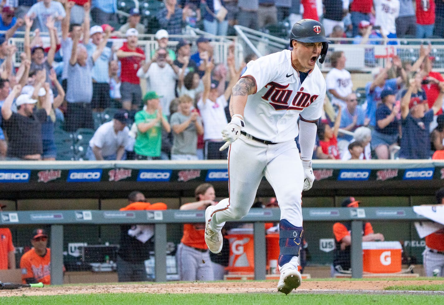 Minnesota Twins pinch hitter Jose Miranda (64) celebrates after hitting a walk-off single in the bottom of the ninth inning to give the Twins a 4-3 win over the Baltimore Orioles Saturday, July 2, 2022 at Target Field in Minneapolis. ]