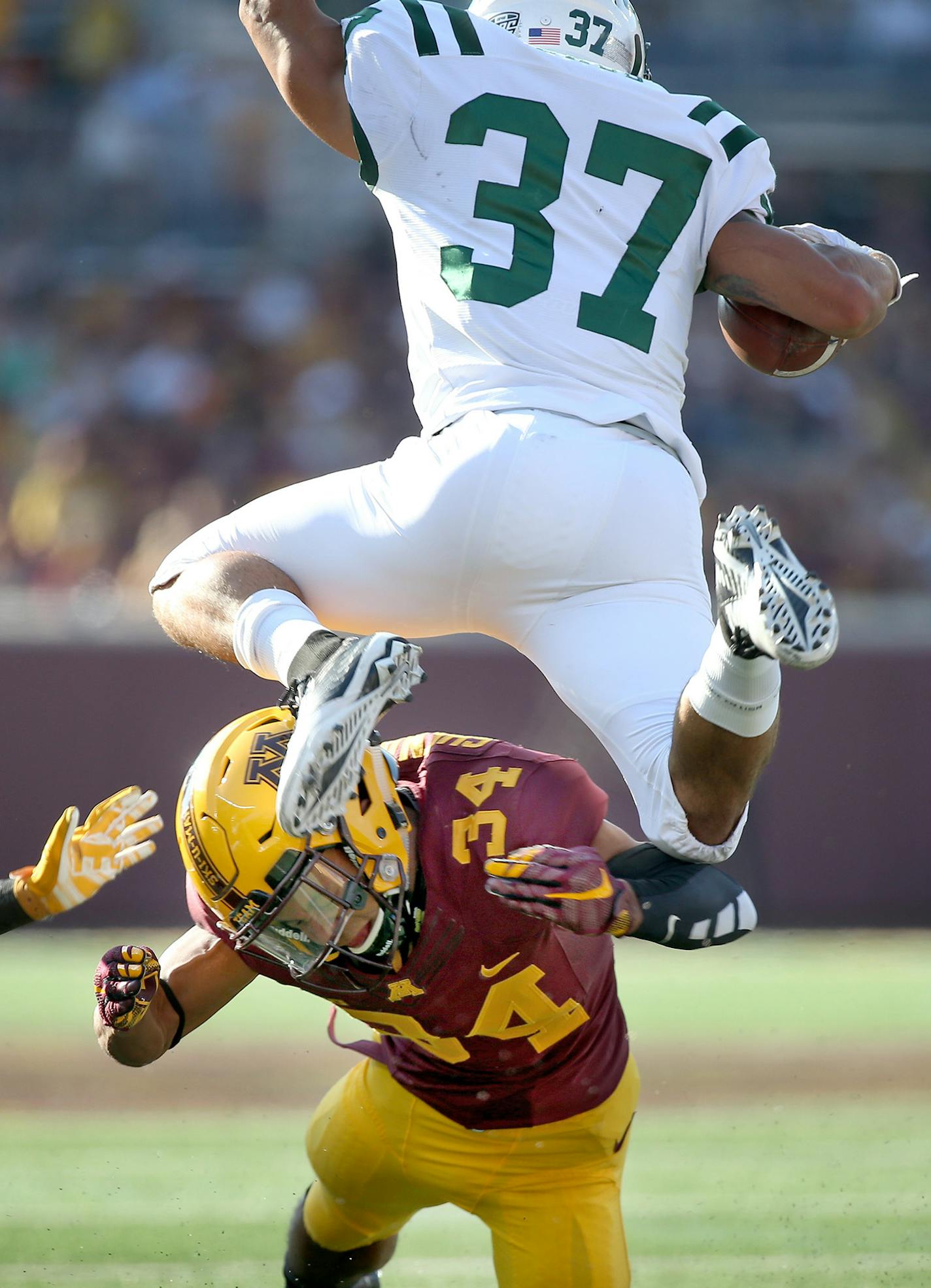 Minnesota's defensive back Antonio Shenault tackled Ohio's cornerback Devin Bass in the third quarter as the Gophers took on Ohio at TCF Bank Stadium, Saturday, September 26, 2015 in Minneapolis, MN. ] (ELIZABETH FLORES/STAR TRIBUNE) ELIZABETH FLORES &#x2022; eflores@startribune.com