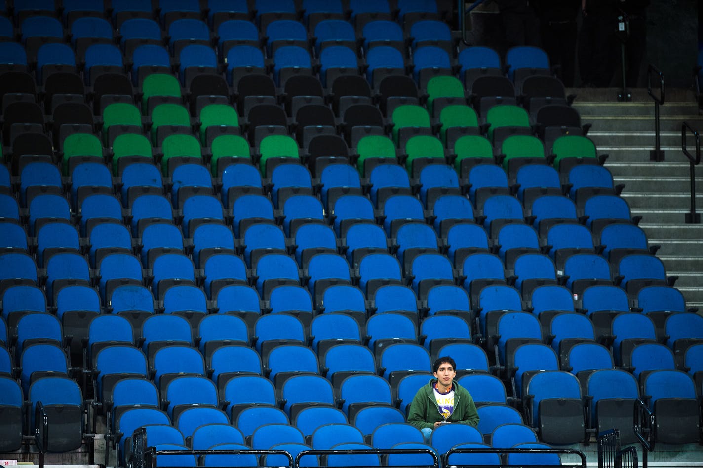 With the exception of a single fan, an entire lower level section was empty during the fourth quarter Wednesday during the Minnesota Timberwolves game against the Memphis Grizzlies. ] (AARON LAVINSKY/STAR TRIBUNE) aaron.lavinsky@startribune.com The Minnesota Timberwolves played the Memphis Grizzlies in a preseason game on Wednesday, Oct. 19, 2016 at Target Center in Minneapolis, Minn.