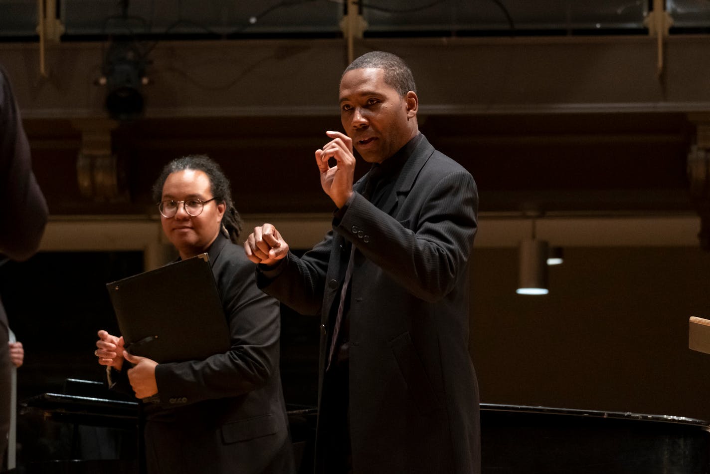 Here are a couple of images that could run with my story on One Voice Mixed Chorus' performance of "Weather." In the picture of just two people, that's Kimberly Waigwa (left) and Rollo Dilworth. The other is of Dilworth conducting the Singing Owls of Temple. These are courtesy of Temple University.