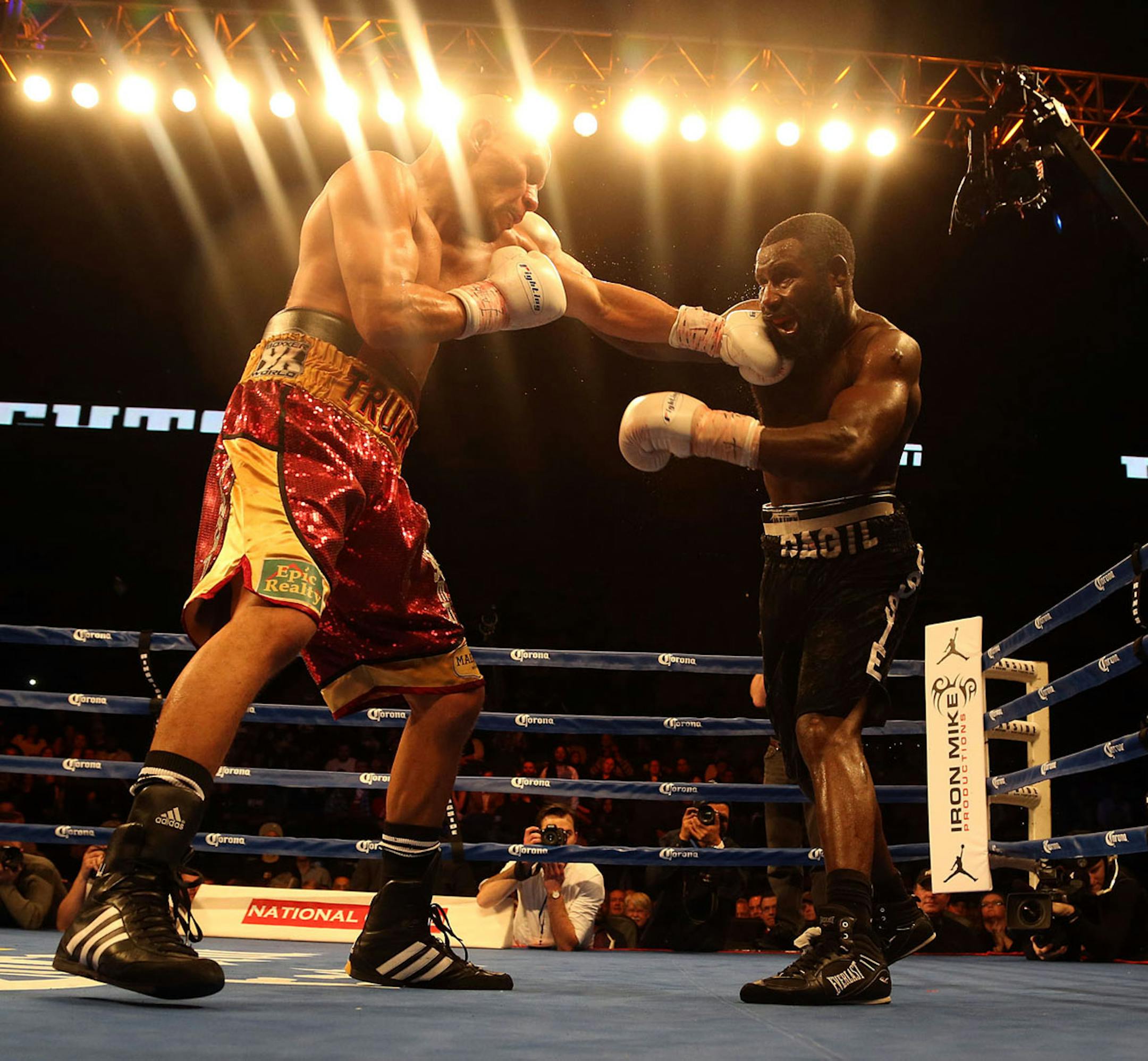 USBA Middleweight Champion Caleb Truax, of Osseo, Minnesota connected with a left cross Ossie Duran aka - The Ghanaian Gladiator during a semi final fight at Target Center in Minneapolis Friday, January 3, 2014. The bout ended in a tie 95-95. ] (KYNDELL HARKNESS/STAR TRIBUNE) kyndell.harkness@startribune.com