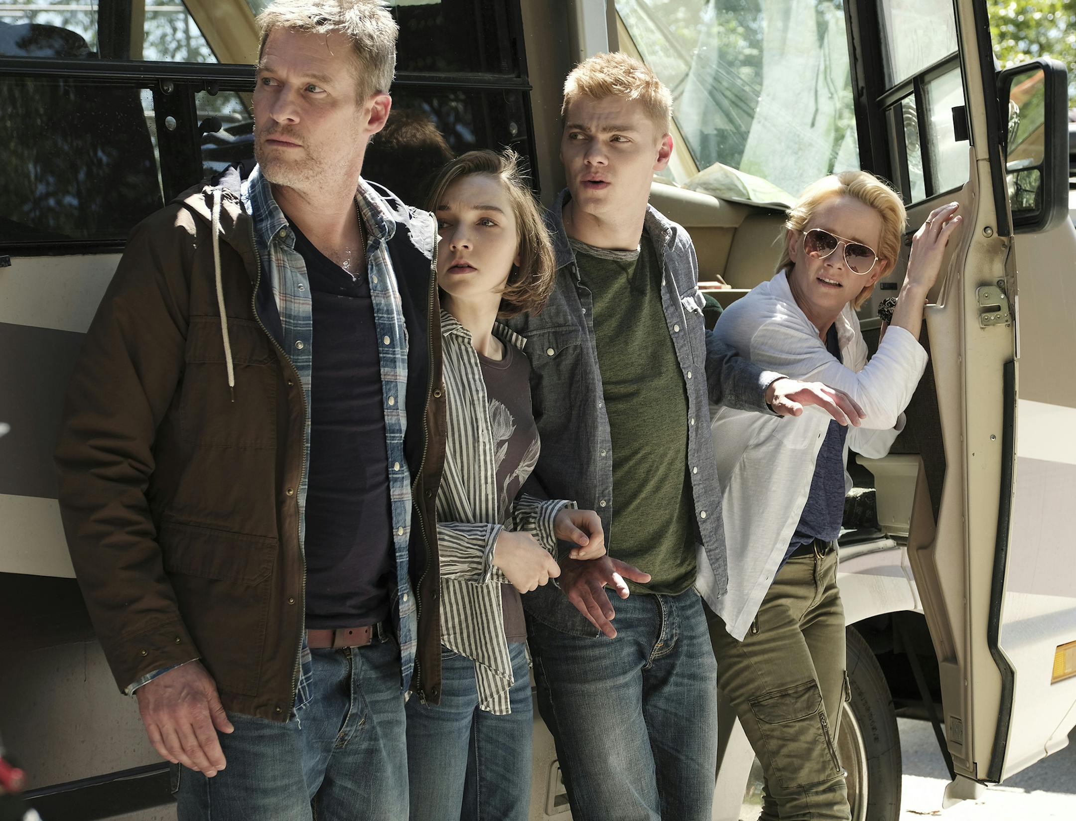 AFTERMATH -- "RVL 6768" Episode 101 -- Pictured: (l-r) James Tupper as Joshua Copeland, Julia Sarah Stone as Dana Copeland, Levi Meaden as Matt Copeland and Anne Heche as Karen Copeland -- (Photo by: Eike Schroter/Aftermath ULC/Syfy) ORG XMIT: Season:1