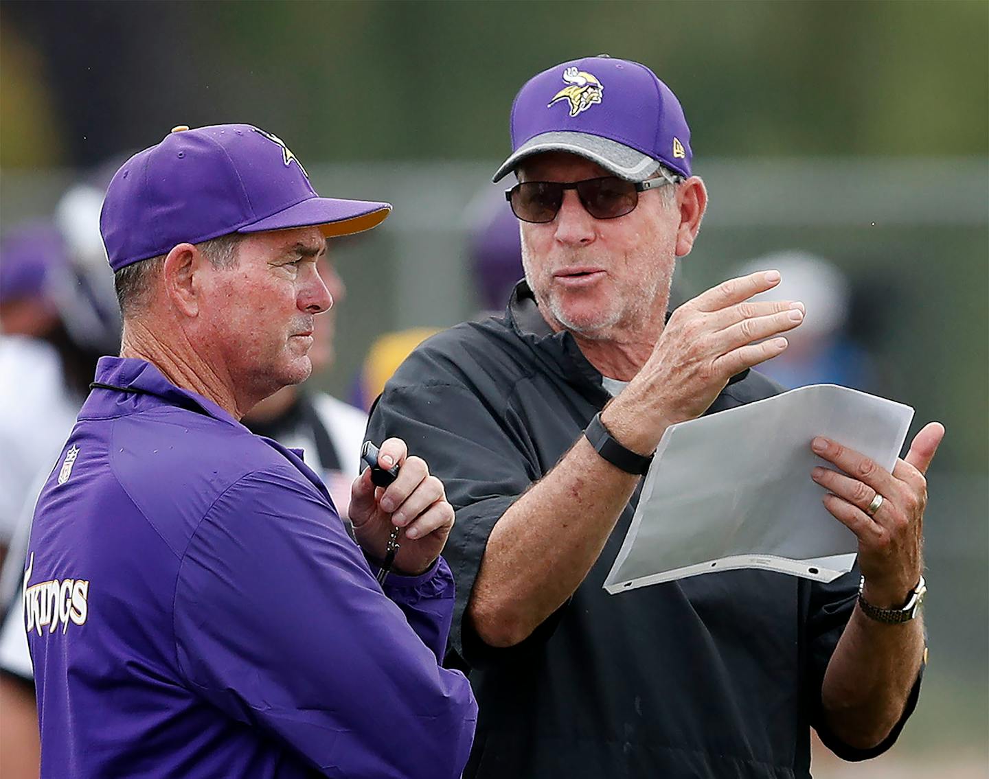 Head coach Mike Zimmer and Norv Turner in August.