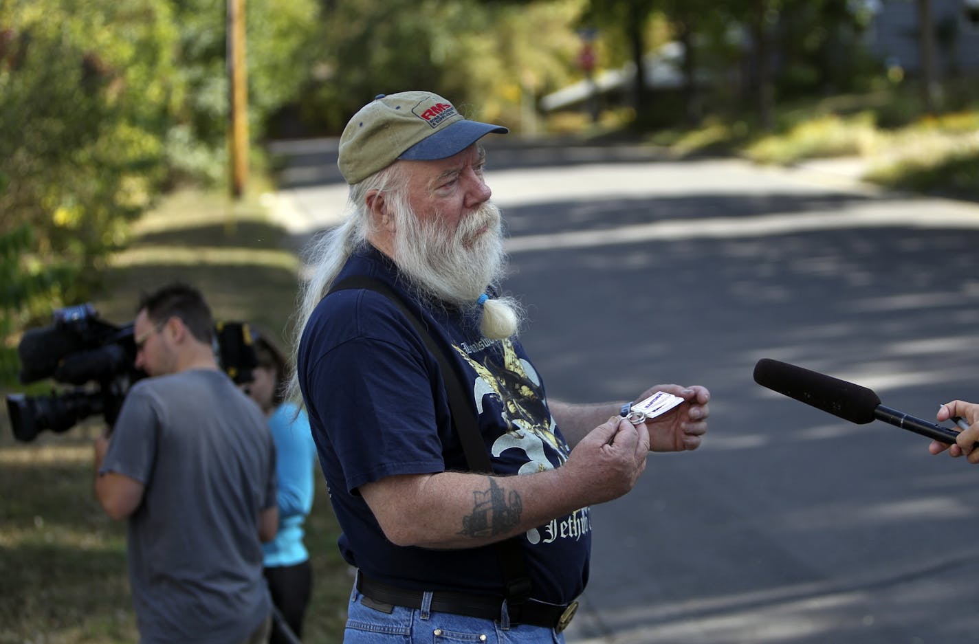 John Gillis, 66, of Hastings, worked at Insty-Bit, a business that leased space inside Accents Signage Systems, Inc. in Minneapolis, MN. Gillis retired on Thursday, but not before the shooting that left 6 people dead in the business next to his. He was interviewed by meida members outside the building Saturday, September 29, 2012.