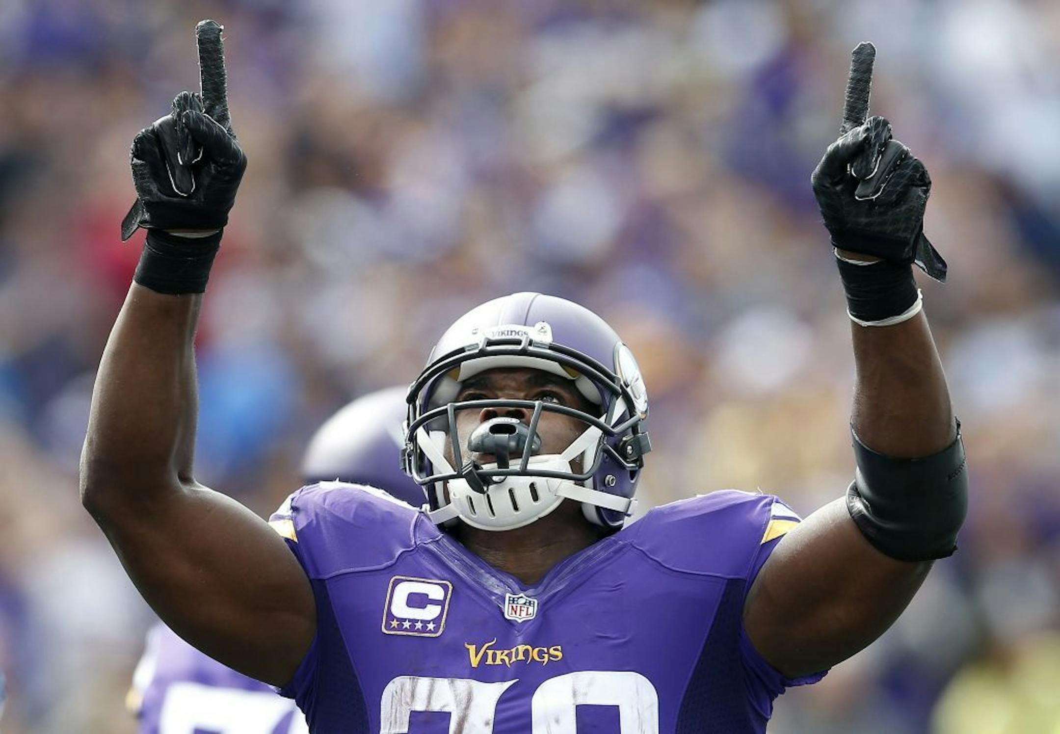 Minnesota Vikings running back Adrian Peterson (28) celebrates after running the ball into the end zone during the first quarter on Sunday, Sept. 20, 2015, at TCF Bank Stadium in Minneapolis. The play was reviewed and ruled not a touchdown.