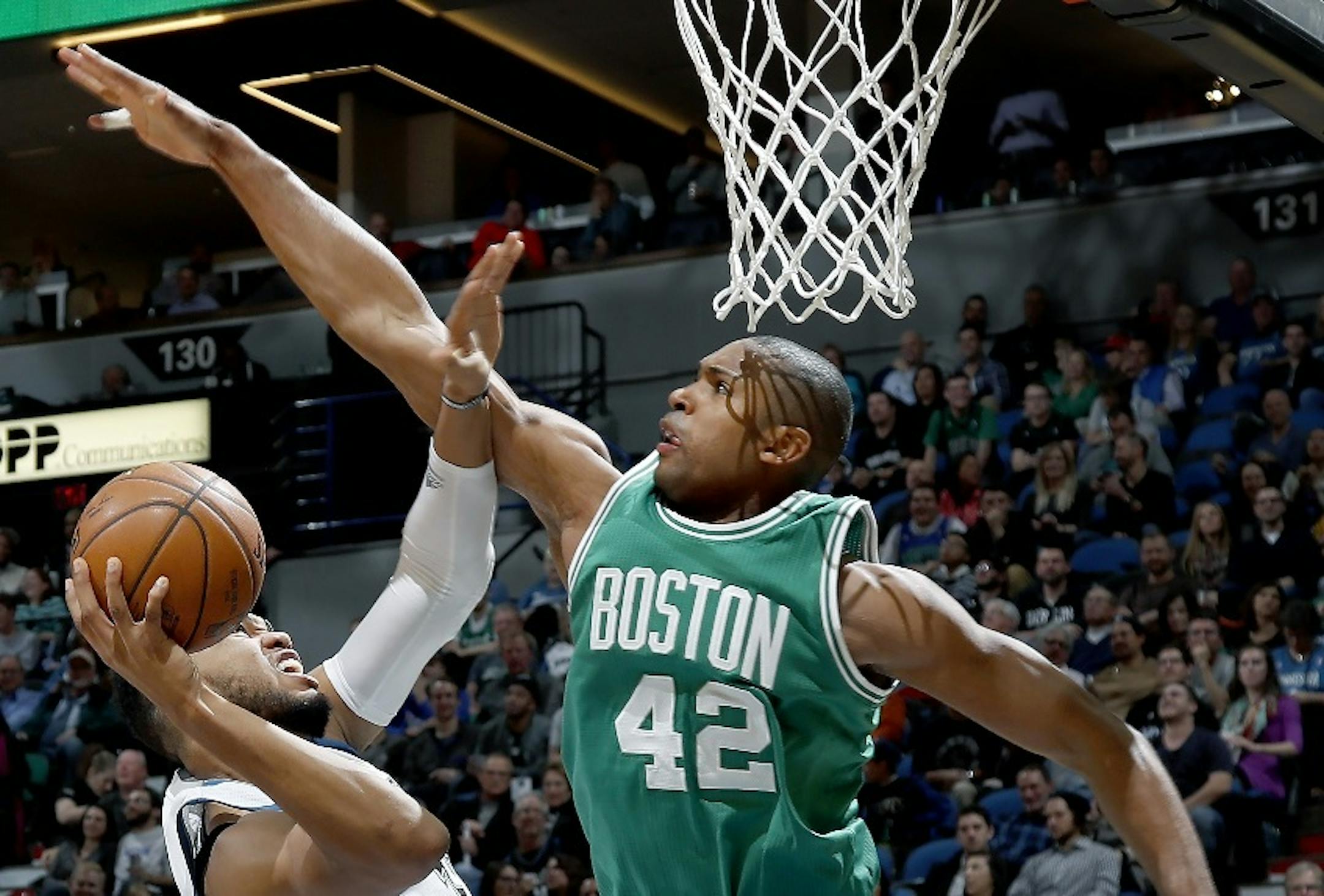 The Wolves' Karl-Anthony Towns found his way blocked by the Celtics' Al Horford in the fourth quarter. ] CARLOS GONZALEZ cgonzalez@startribune.com - November 21, 2016, Minneapolis, MN, Target Center, NBA, Minnesota Timberwolves vs. Boston Celtics Date Input: November 21, 2016 Source: 20046210A Byline: Carlos Gonzalez Credit: Star Tribune