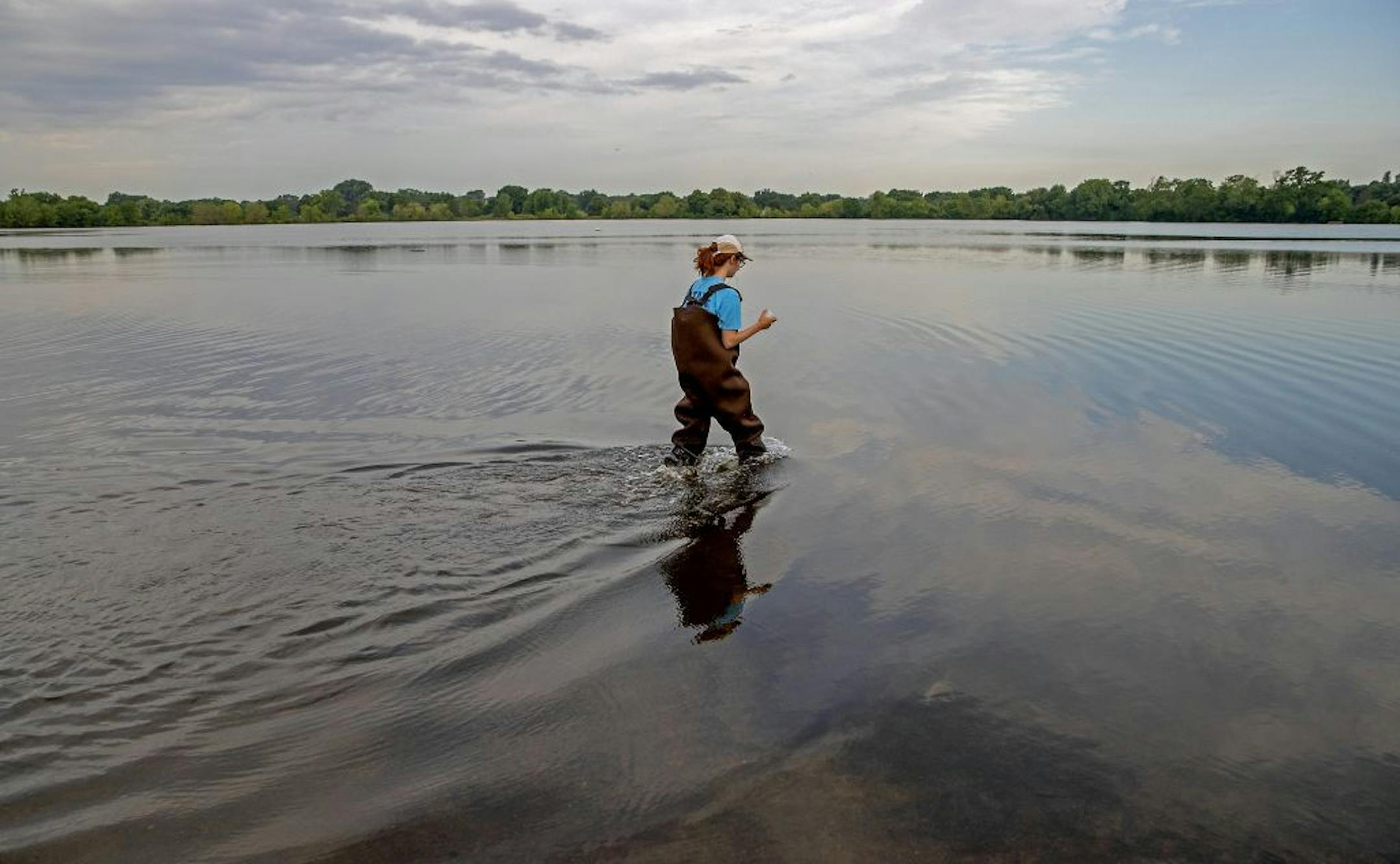 Minneapolis Parks and Recreation staffer Katie Cassidy made her routine water sampling of 12 Minneapolis beaches including Lake Hiawatha beach, Monday, July 15, 2019 in Minneapolis, MN.
