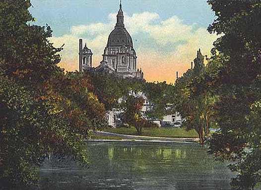 Basilica of St. Mary seen through the trees in the park circa 1940.