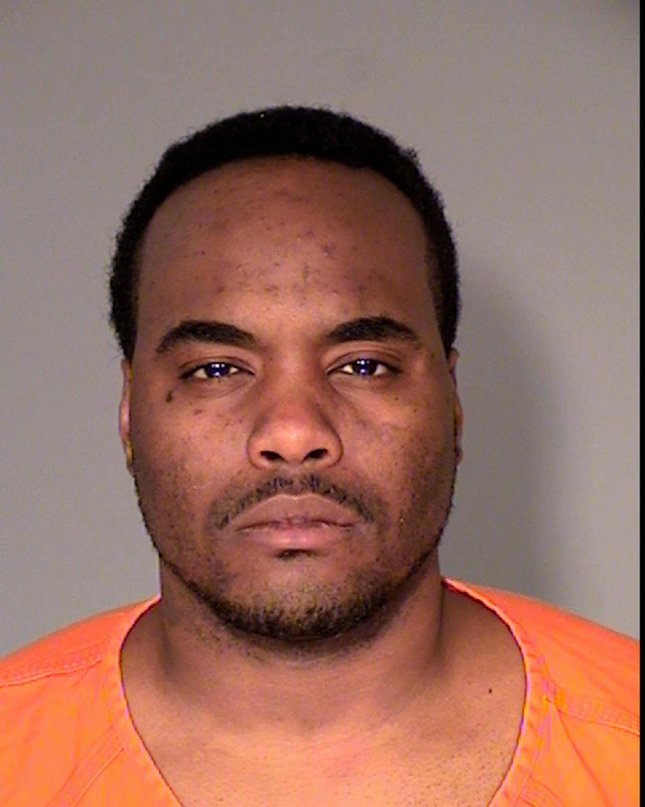 Mark A. Smith, charged in armed robberies.
