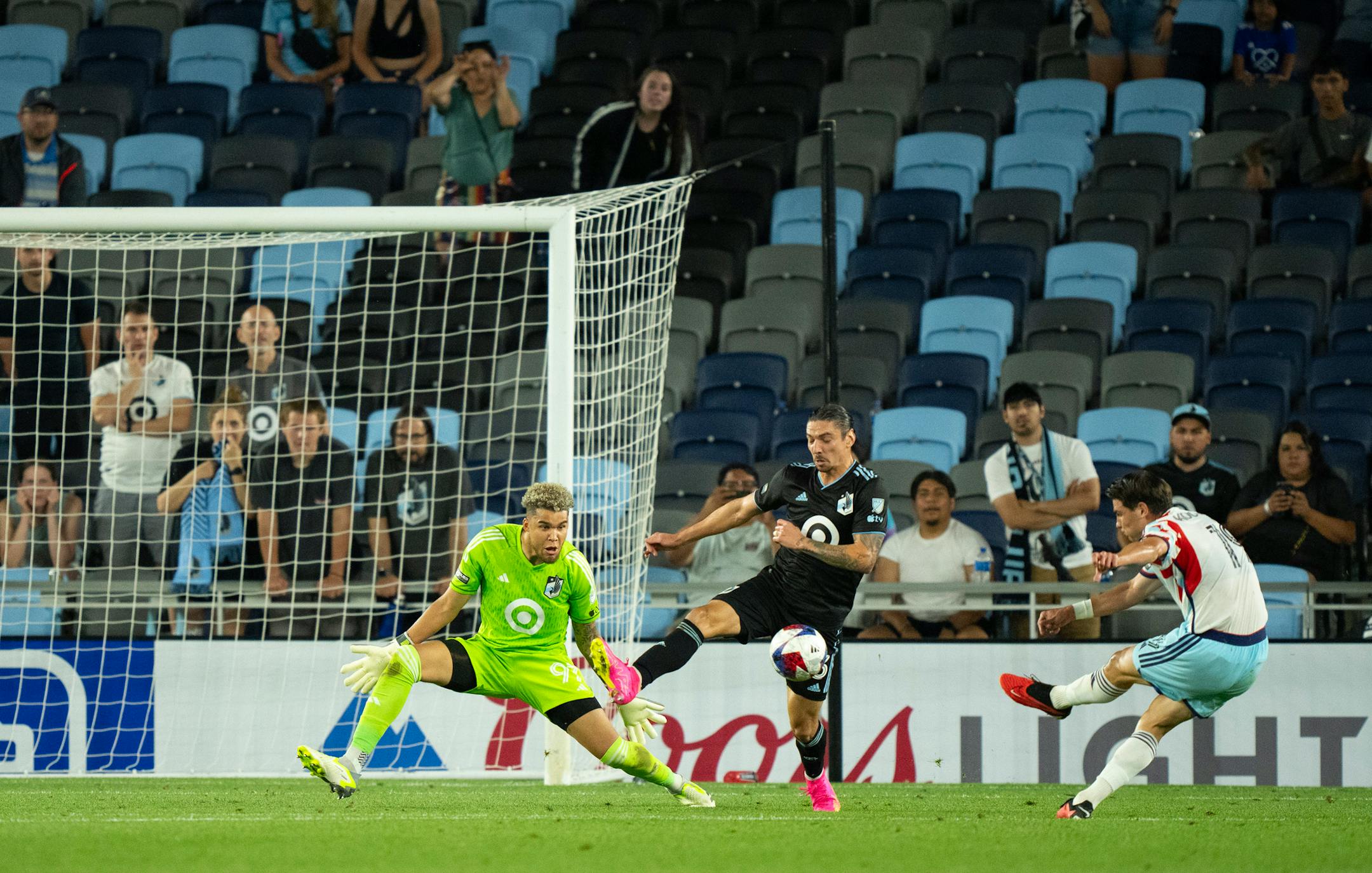 Minnesota United defender Zarek Valentin (3) helped out Minnesota United goalkeeper Dayne St. Clair (97) by stopping a shot by Chicago Fire forward Georgios Koutsias (19) late in the second half.