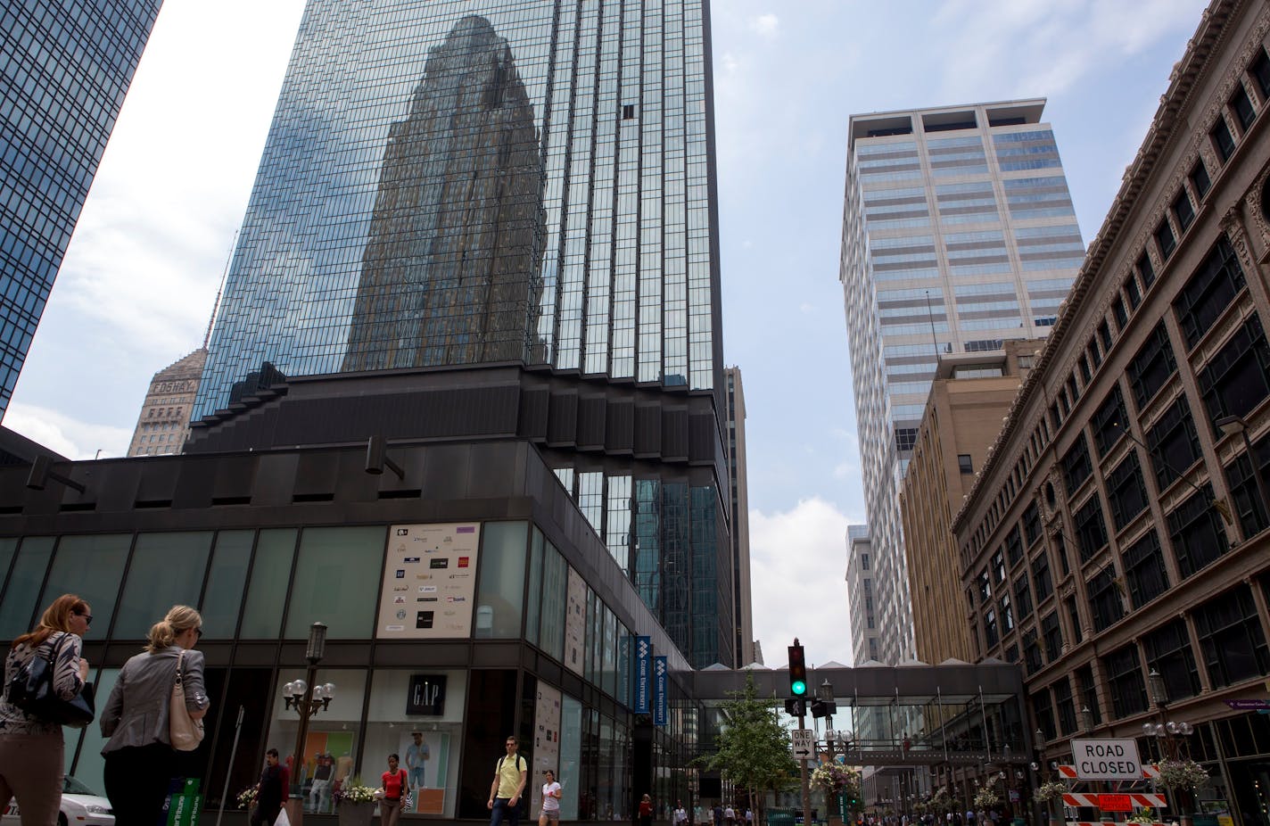 People walk by Gap at 7th and Nicollet Mall in Minneapolis, Minn., Monday, July 13, 2015. The IDS Center location of Gap is closing.] KAYLEE EVERLY kaylee.everly@startribune.com