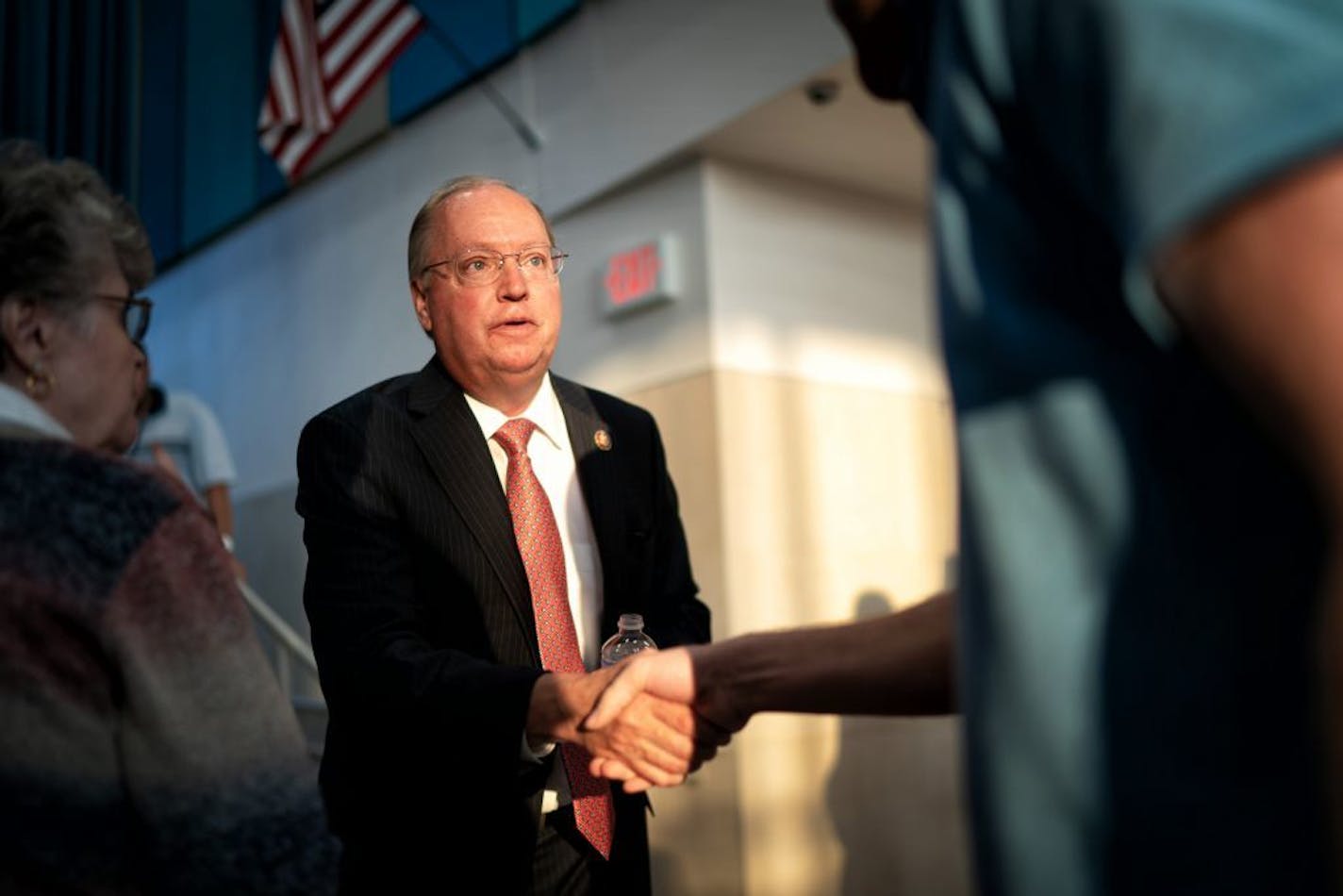 U.S. Rep. Jim Hagedorn shook hands with attendees at the end of his town hall at Owatonna Middle School.