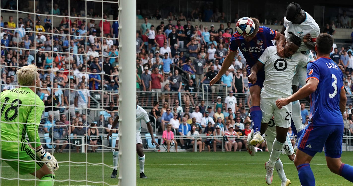 Minnesota United forward Mason Toye (23) blocked FC Cincinnati defender Nick Hagglund (14) as Minnesota United defender Ike Opara (3) headed the ball past FC Cincinnati goalkeeper Spencer Richey (18) in the second half. ] ANTHONY SOUFFLE &#x2022; anthony.souffle@startribune.com The Minnesota United played FC Cincinnati in an MLS match Saturday, June 29, 2019 at Allianz Field in St. Paul, Minn.