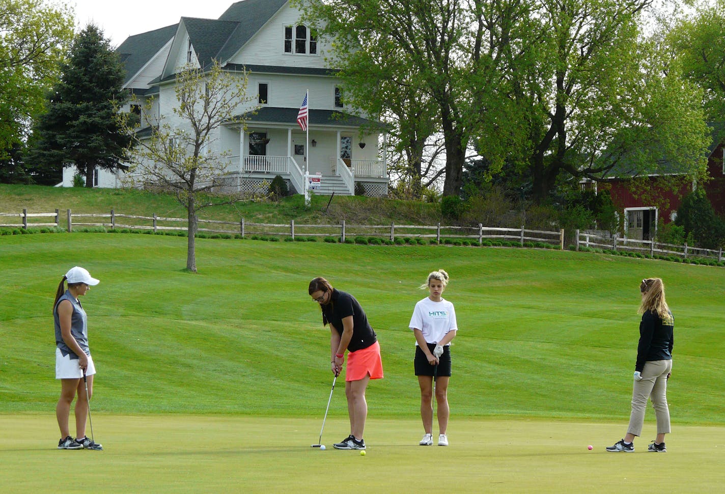 New Life High School girls' golf team members at Woodbury's Eagle Valley golf course. Photo by Dave Peterson